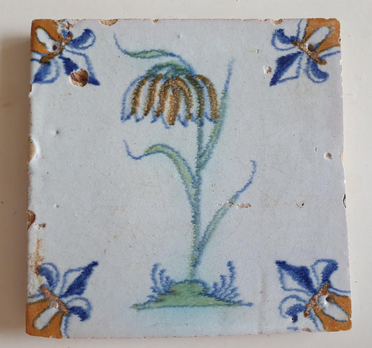 dutch flower  Gouda rare delft polychrome tile, 1620