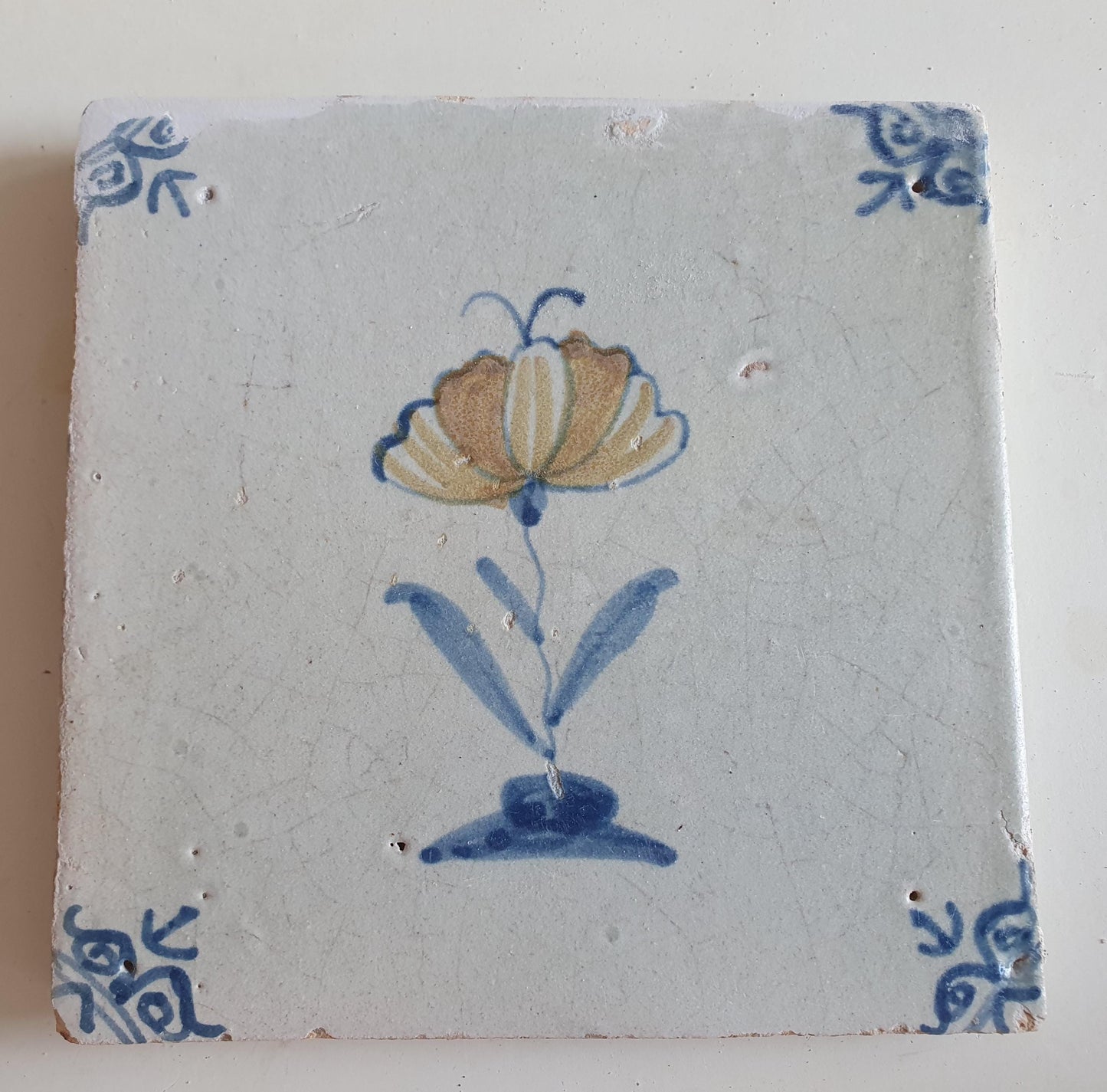 Antique Dutch Tile - polychrome flower with butterfly, ox head corner motives - Dated 1630 RARE !