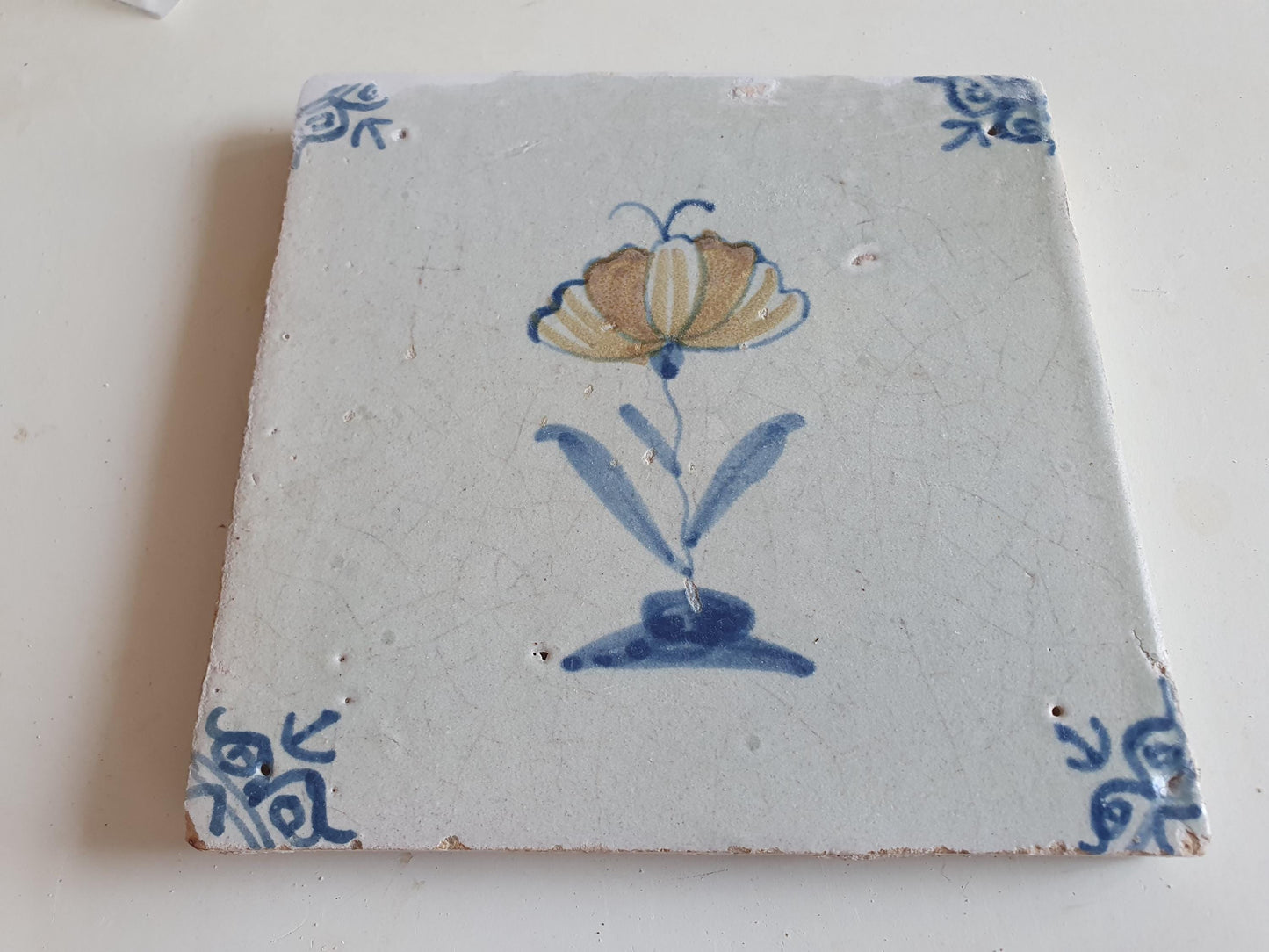 Antique Dutch Tile - polychrome flower with butterfly, ox head corner motives - Dated 1630 RARE !