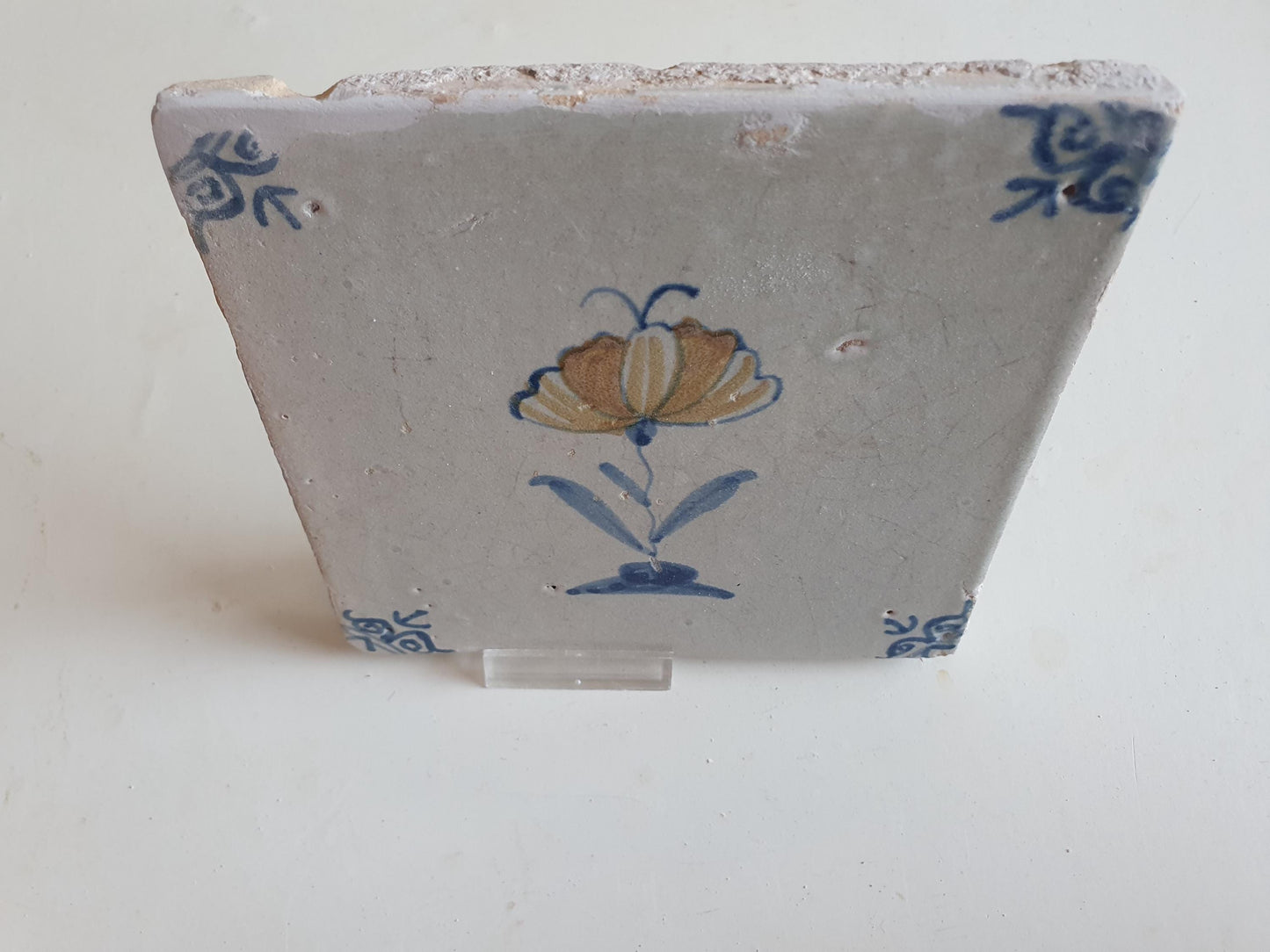 Antique Dutch Tile - polychrome flower with butterfly, ox head corner motives - Dated 1630 RARE !