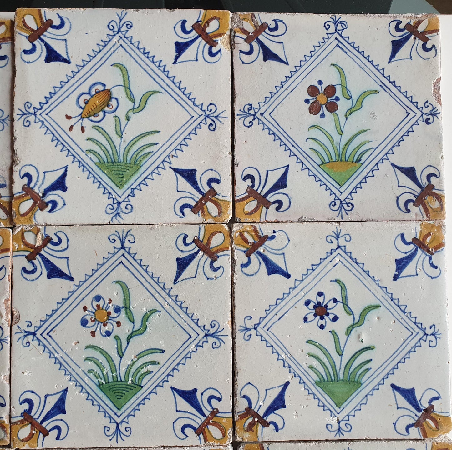 17th Century Delft Tiles | Antique Dutch Tilefield, Floral Motifs (16pc)