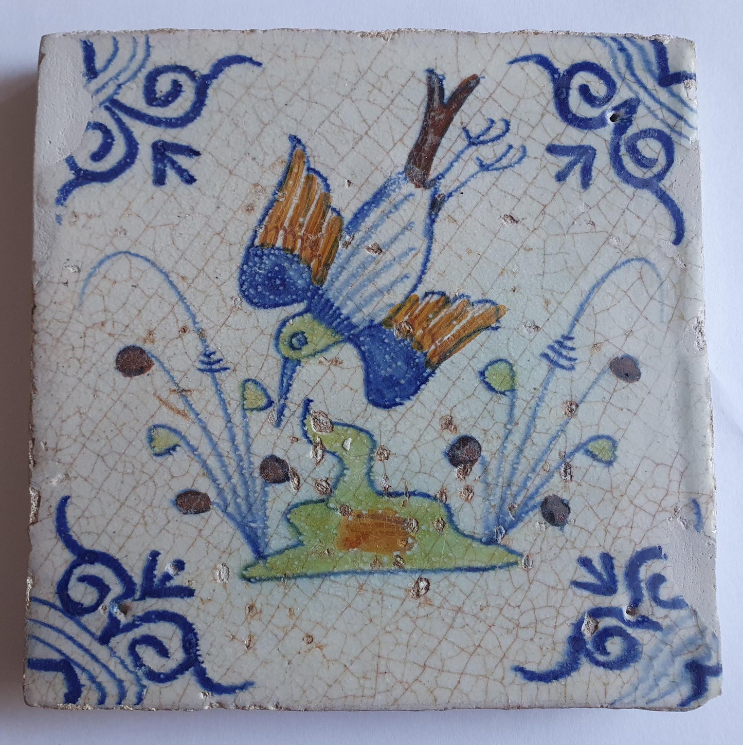 Antique Delft Tile – Polychrome Bird, Oxhead Motif (circa 1630)