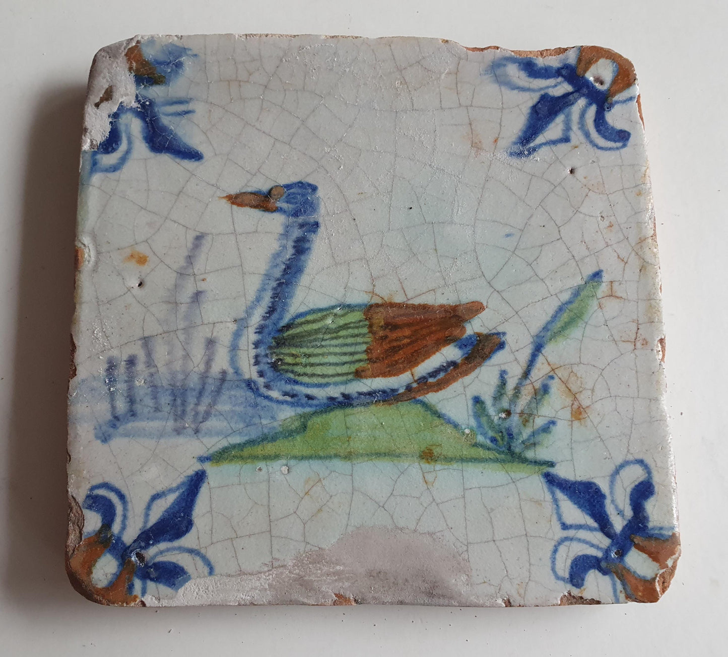 Antique Delft Tile – Polychrome Swan, Lily Corner Motifs, 1630
