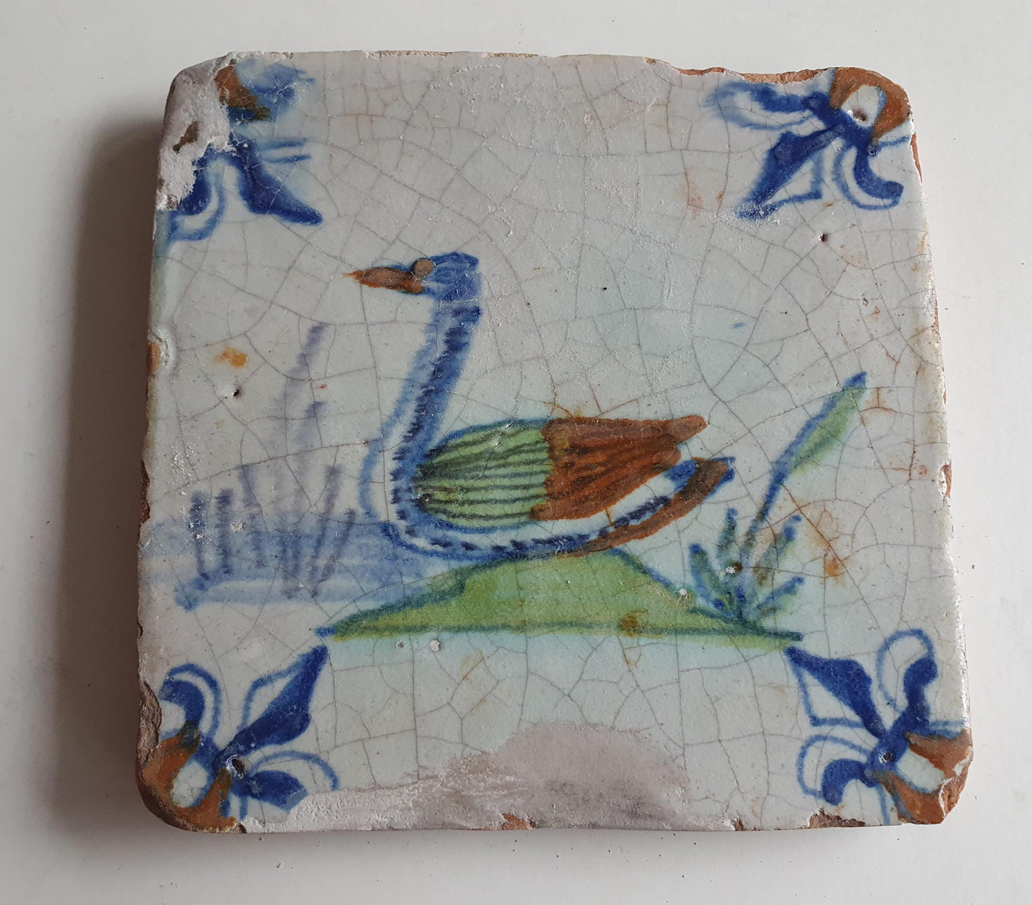 Antique Delft Tile – Polychrome Swan, Lily Corner Motifs, 1630