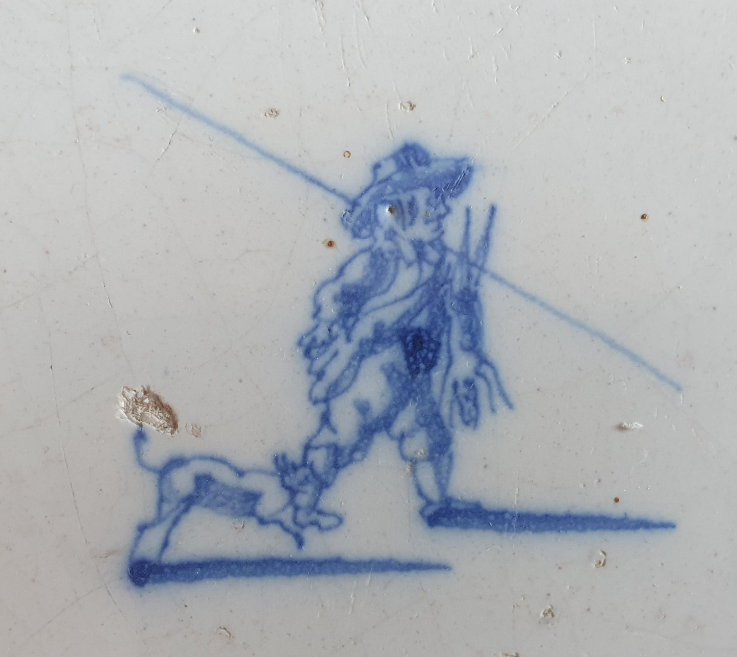 Antique Dutch tile with hunter, dog and hare around 1700 hunting scene