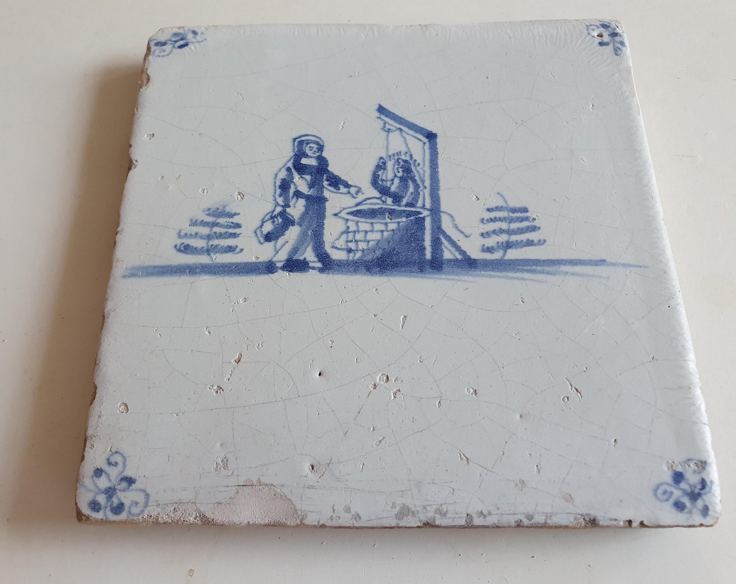 Antieke tegel met Bijbelse voorstelling   in spinnekophoek, antique dutch delft blue tile bible 17th