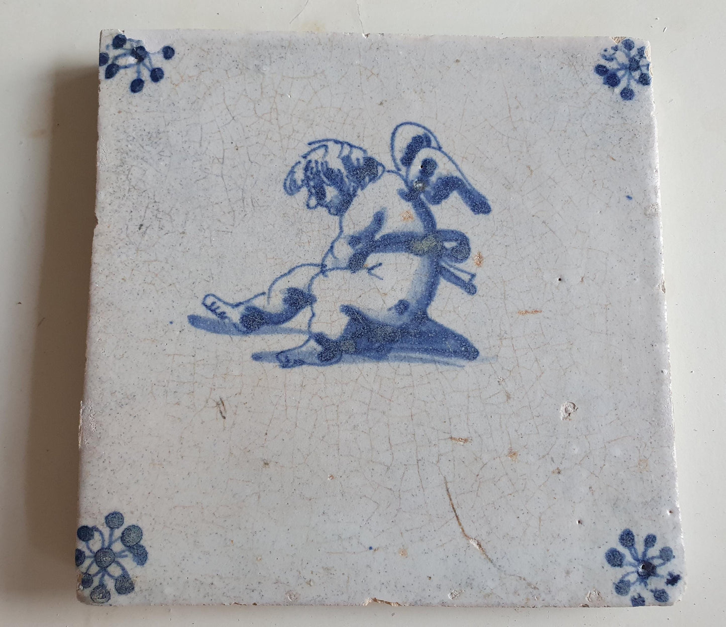 Antique Dutch Tile -  angel   - Dated 1640, spiderhead corner, delft blue , holland 17th century