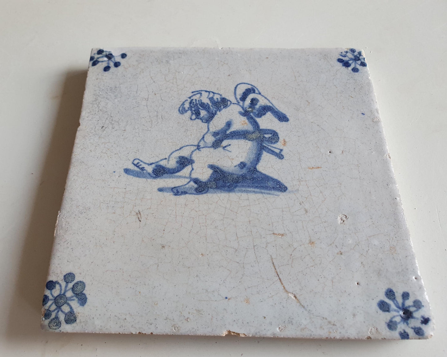 Antique Dutch Tile -  angel   - Dated 1640, spiderhead corner, delft blue , holland 17th century