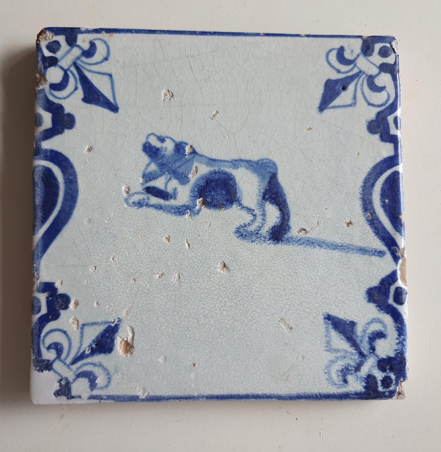 Antique Delft Tile, 17th Century Dutch Dog, Lily Corner Motif
