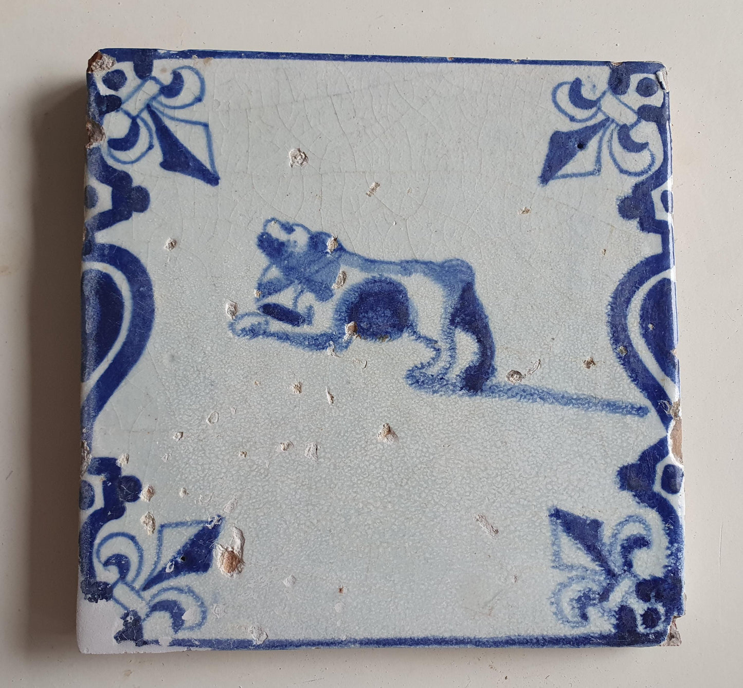 Antique Delft Tile, 17th Century Dutch Dog, Lily Corner Motif