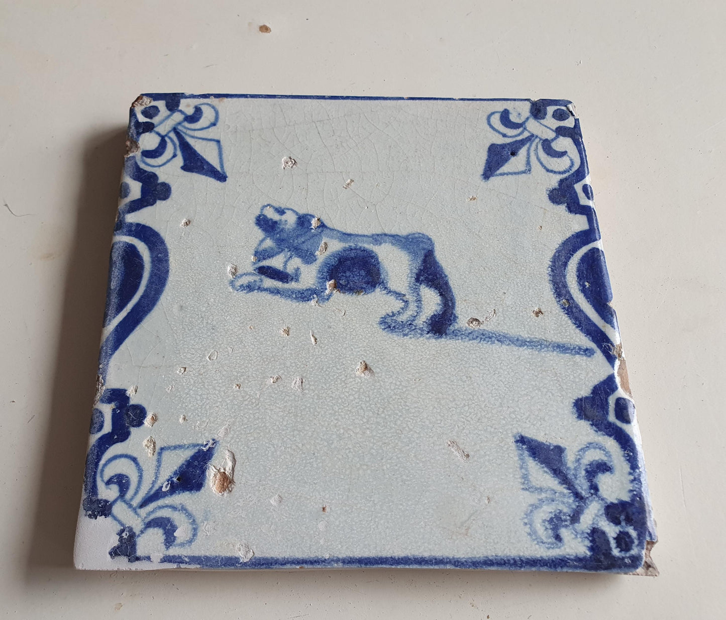 Antique Delft Tile, 17th Century Dutch Dog, Lily Corner Motif