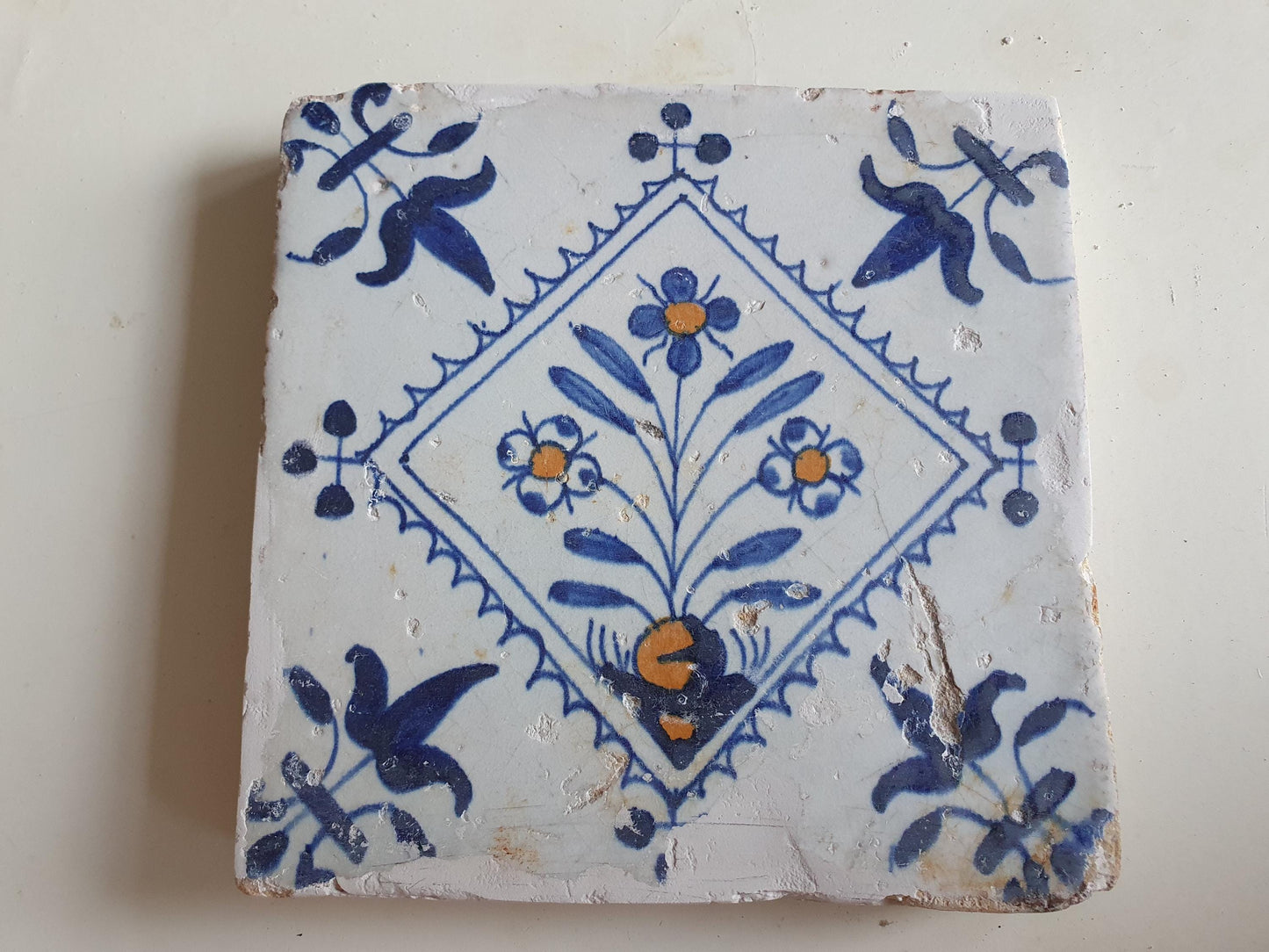 Dutch  polychrome flower antique tile 17th century - delft holland ornament tile 1600- 1620