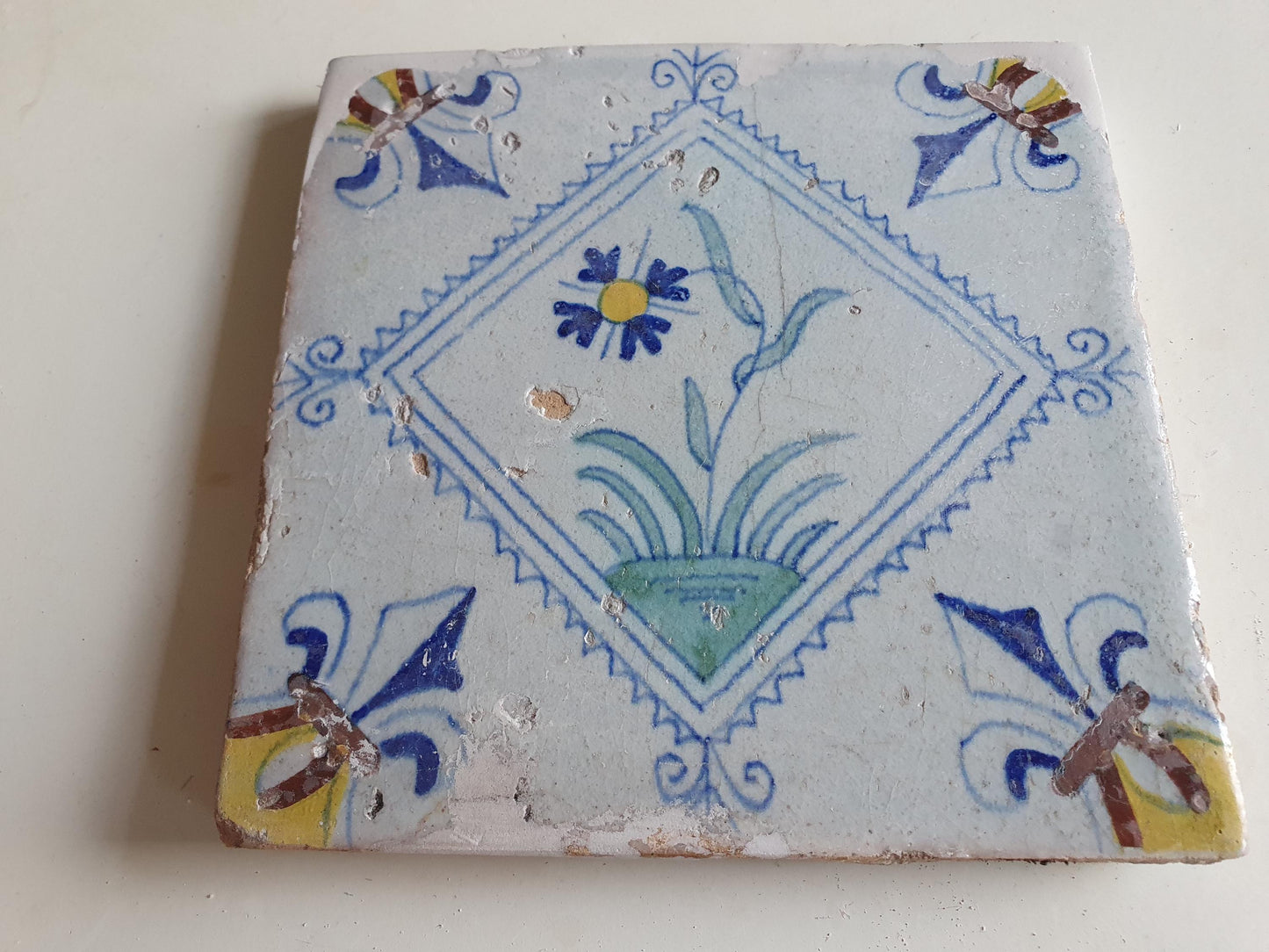 Dutch  polychrome flower antique tile 17th century - delft holland  tile  1640