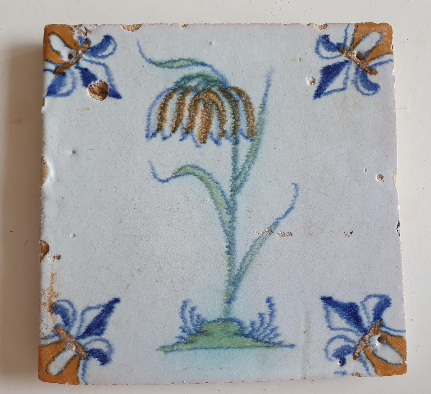 dutch flower  Gouda rare delft polychrome tile, 1620
