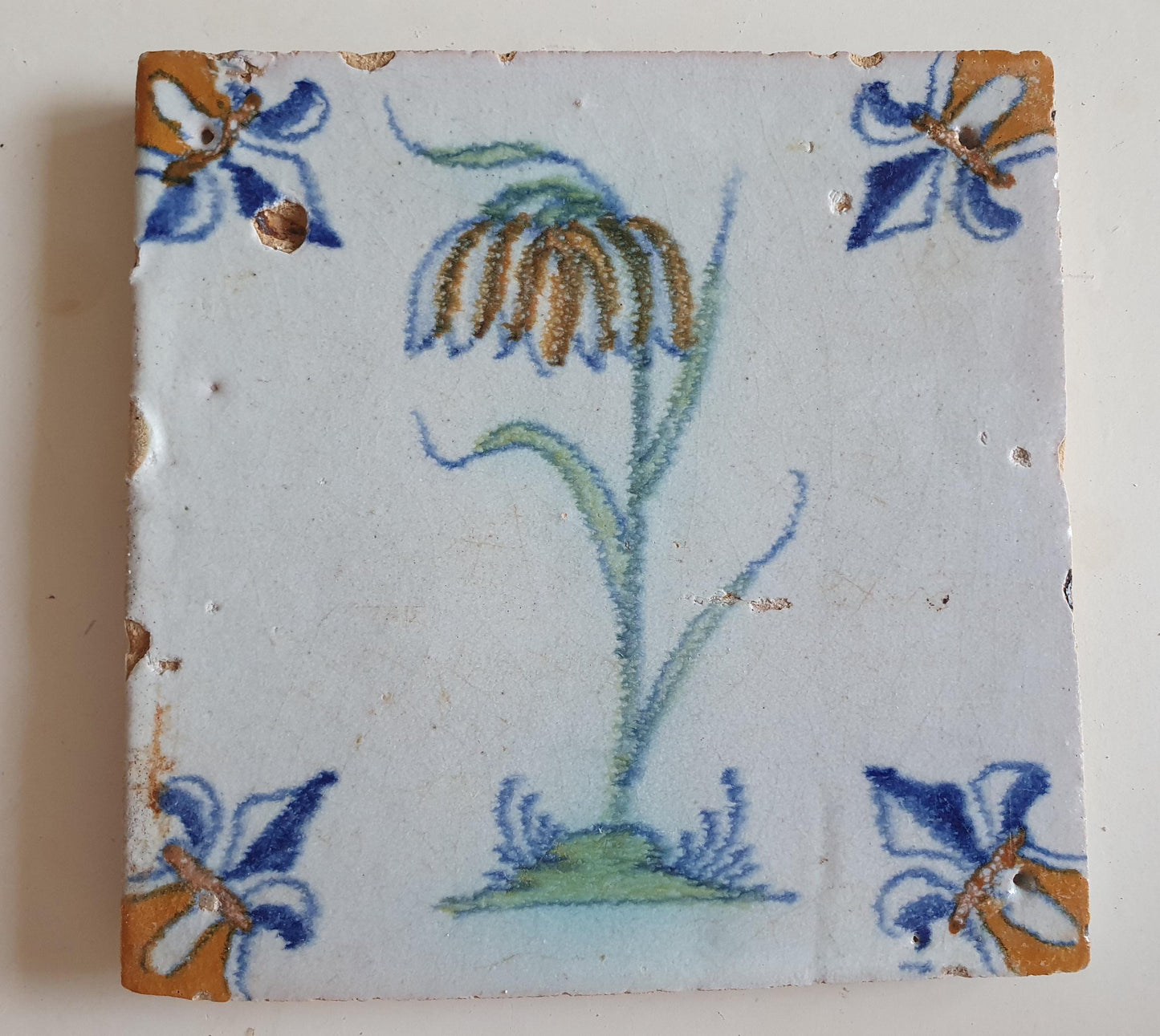 dutch flower  Gouda rare delft polychrome tile, 1620