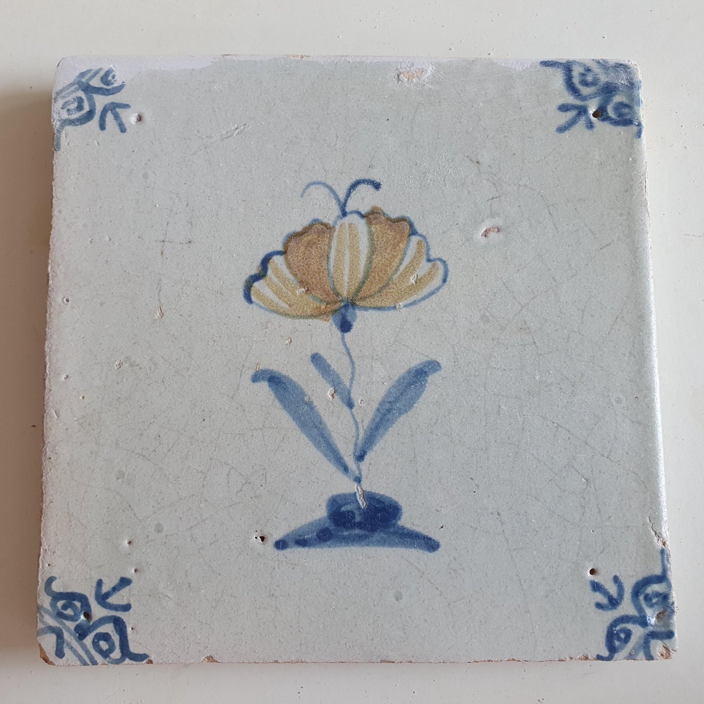 Antique Dutch Tile - polychrome flower with butterfly, ox head corner motives - Dated 1630 RARE !