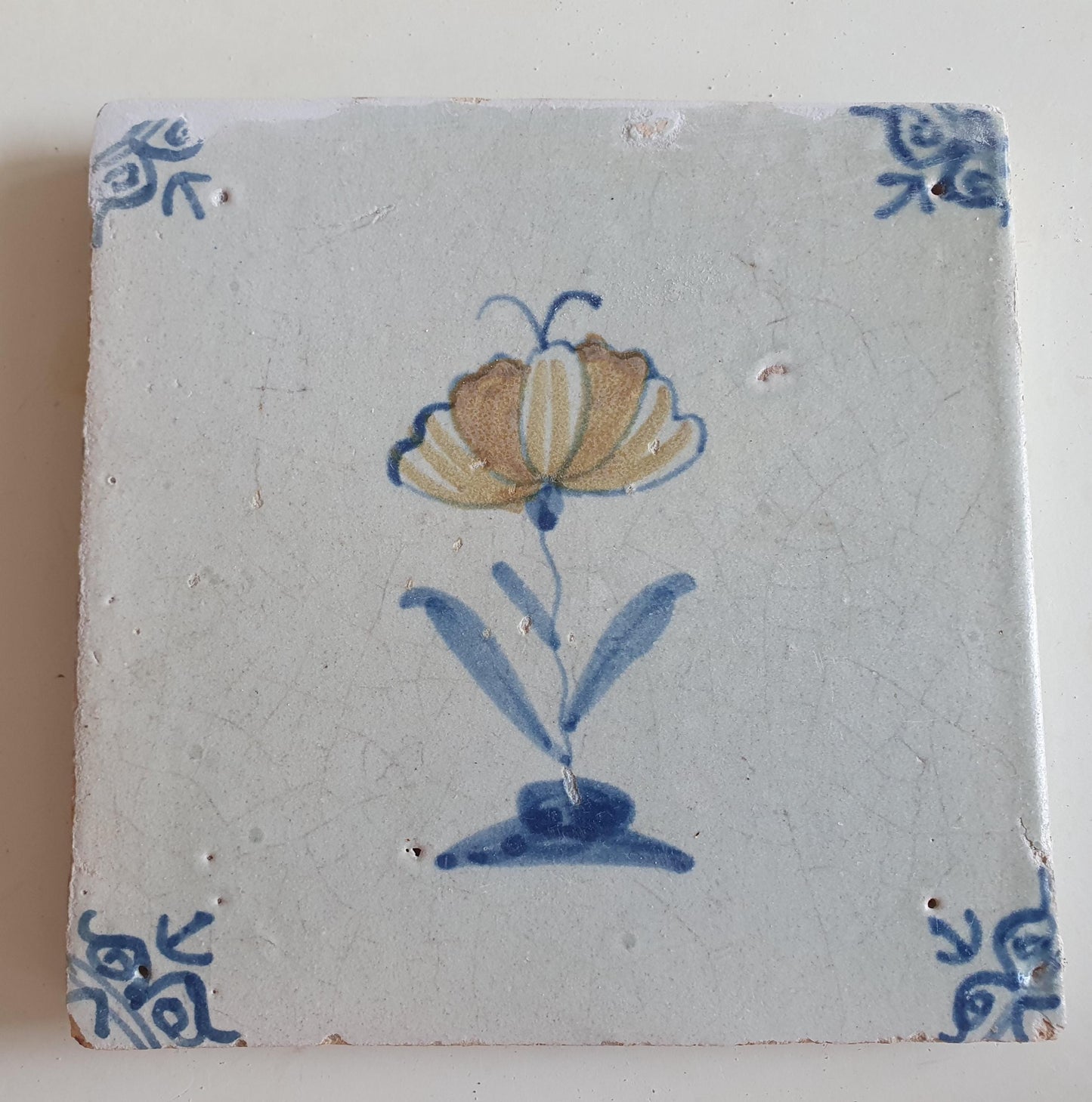 Antique Dutch Tile - polychrome flower with butterfly, ox head corner motives - Dated 1630 RARE !
