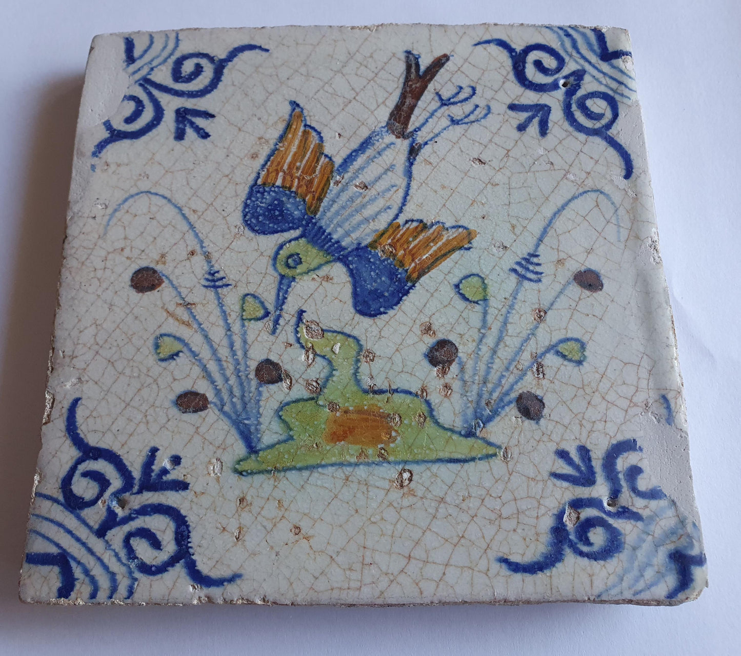 Antique Delft Tile – Polychrome Bird, Oxhead Motif (circa 1630)