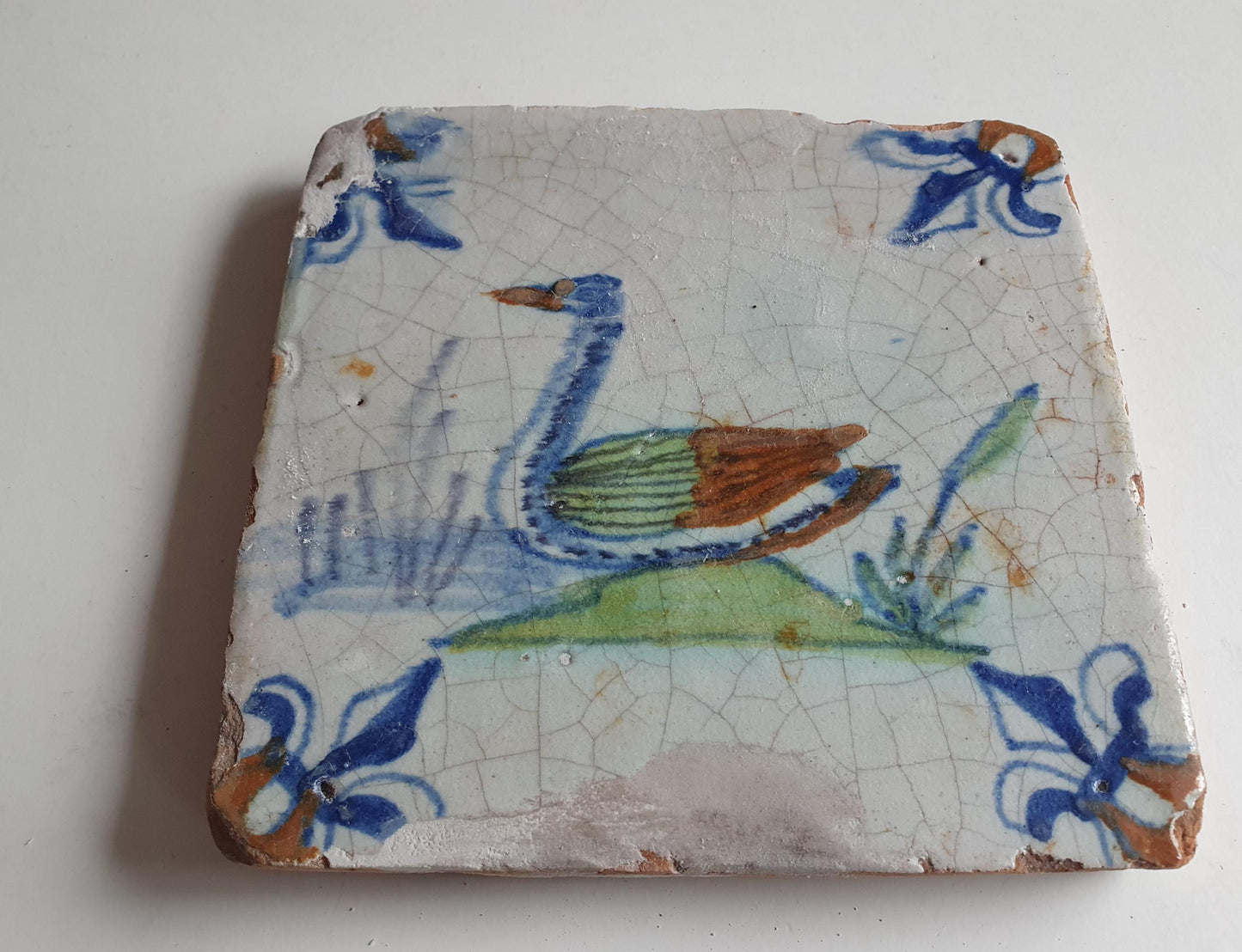 Antique Delft Tile – Polychrome Swan, Lily Corner Motifs, 1630