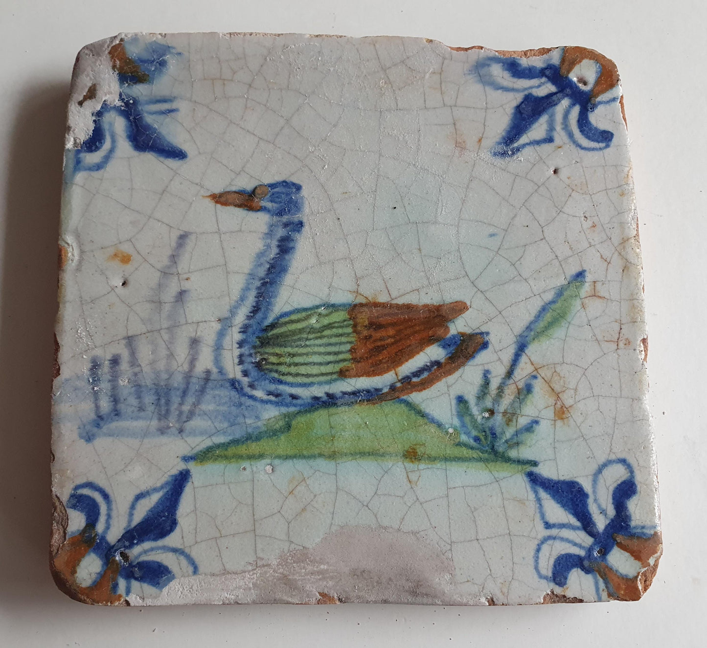 Antique Delft Tile – Polychrome Swan, Lily Corner Motifs, 1630