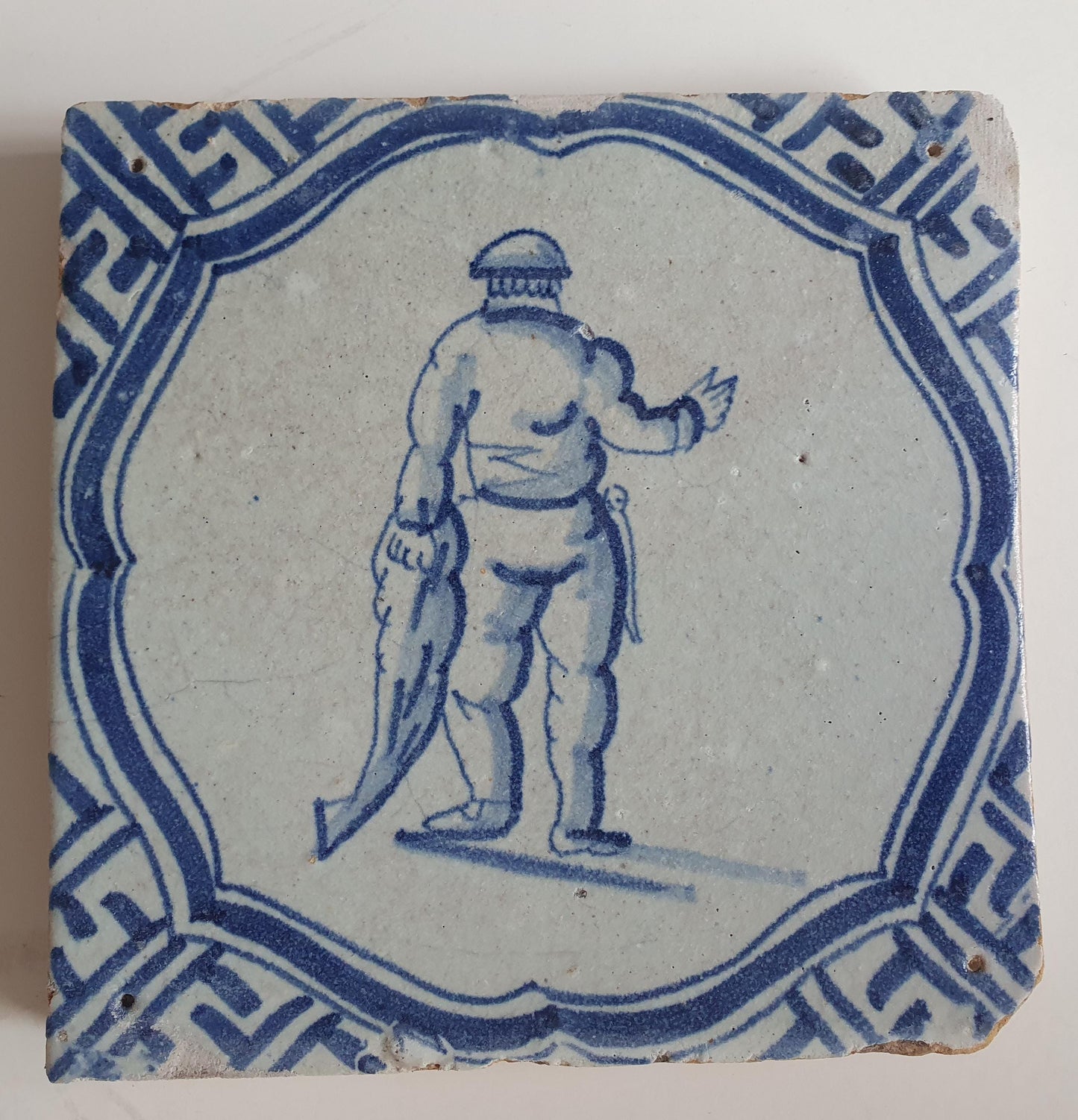 Antique Dutch Tile - fisherman in scalloped frame with meander - Dated 1620-1650,  delft tegel