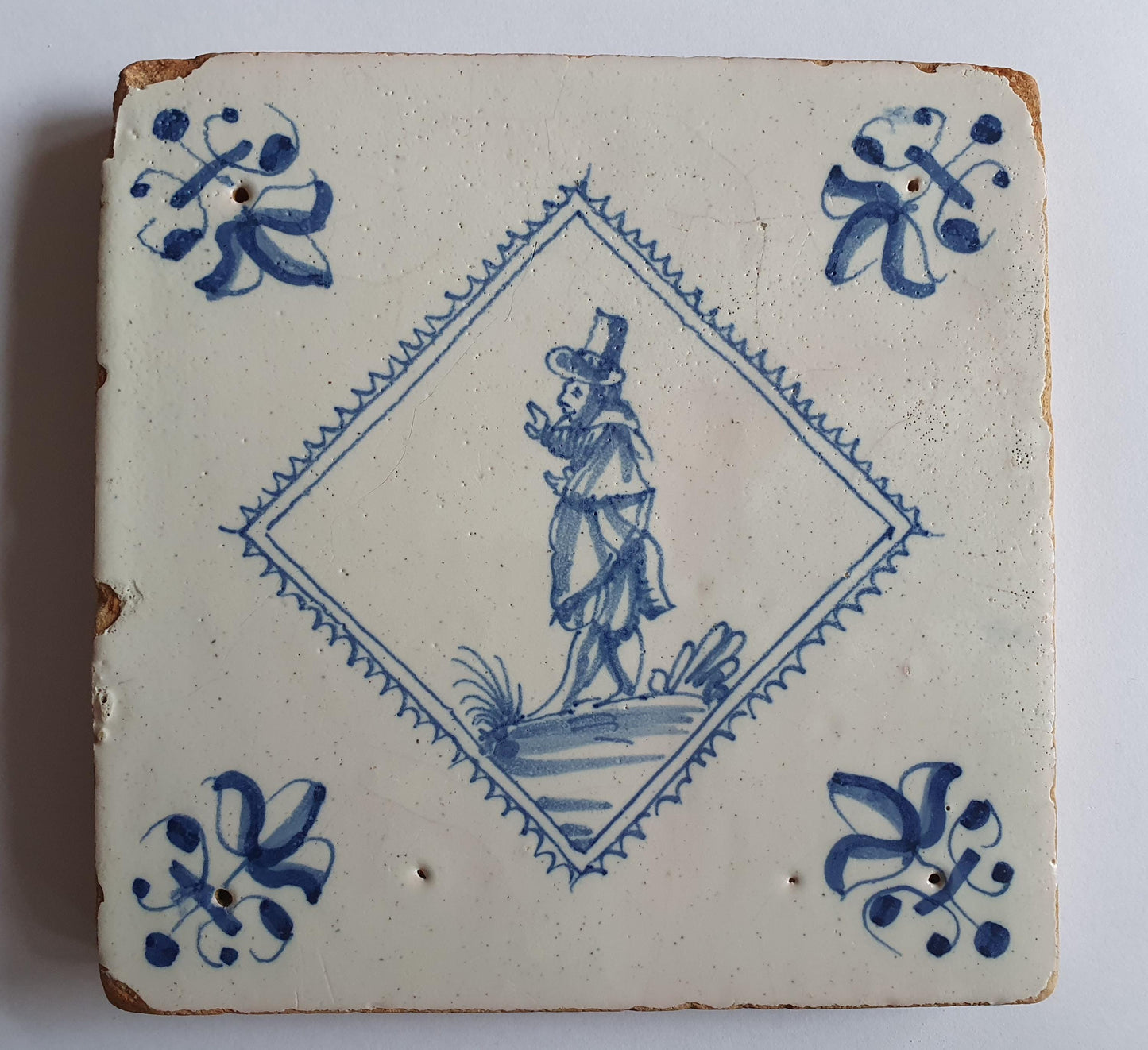 Dutch 17th  antique Delft tile, tegel, gentleman, RARE, lilyhead corner, around 1620