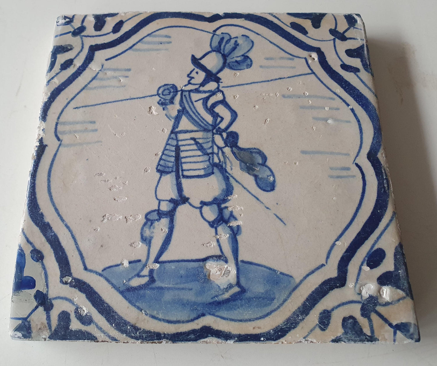 Antique Dutch Delft Tile – 17th Century Soldier with Javelin
