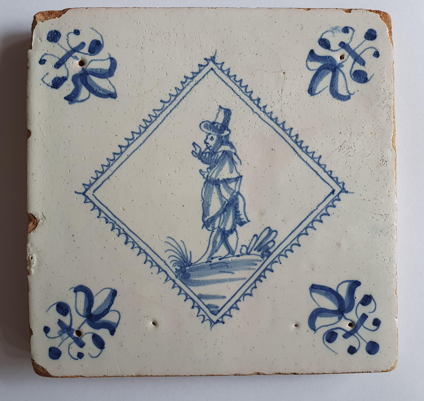 Dutch 17th  antique Delft tile, tegel, gentleman, RARE, lilyhead corner, around 1620