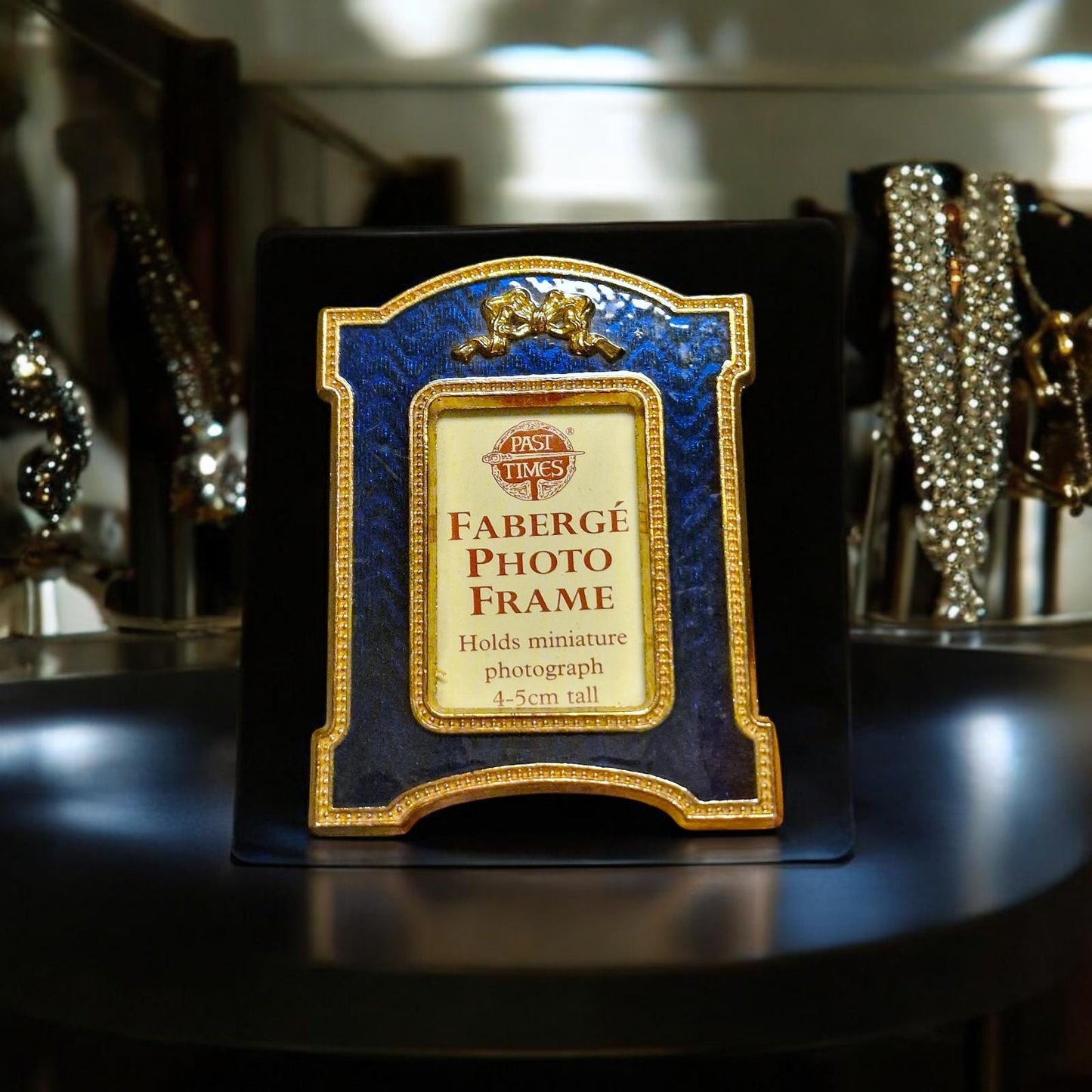 Fabergé guilloche gilt photoframe for small photo
