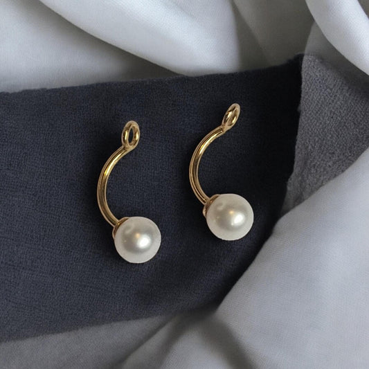 Tous 18 karaat gouden oorbellen met Cultivée parel - achterkant / dubbel swing oorbel