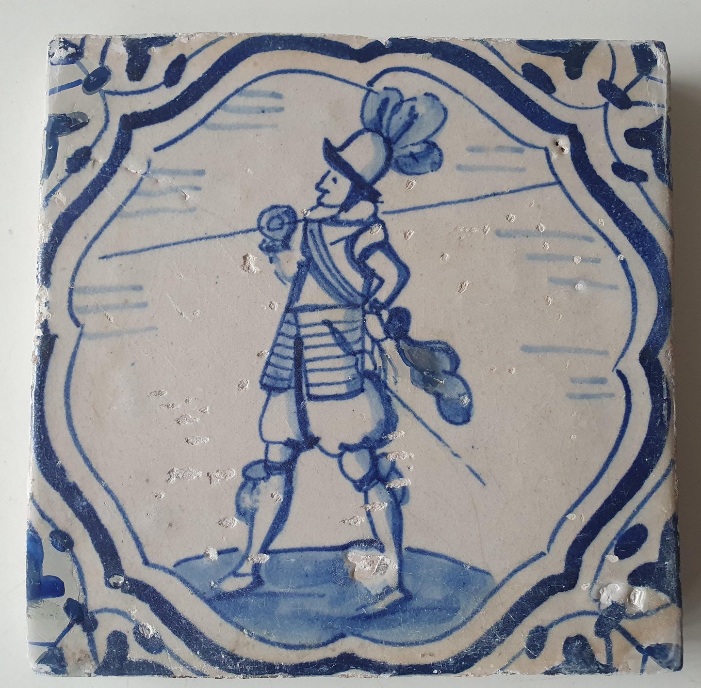 Antique Dutch Delft Tile – 17th Century Soldier with Javelin