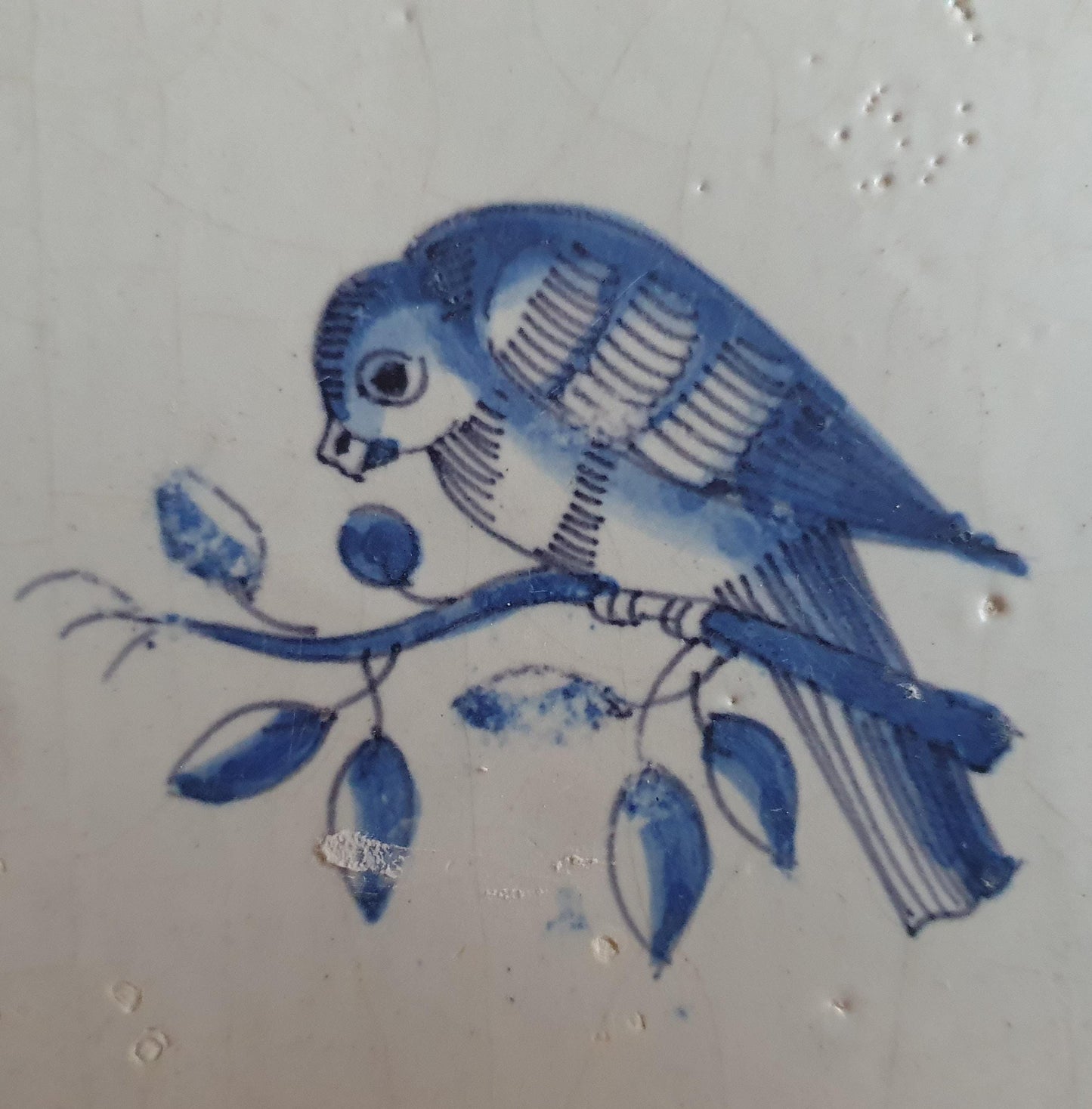 17th century Antique Dutch Tile bird with oxhead corner motive delft blue holland tile