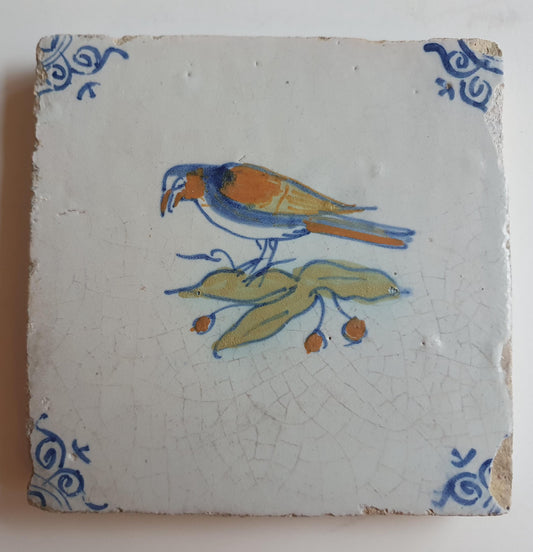 Antique Delft Tile – Polychrome Bird, Oxhead Motifs, c. 1625