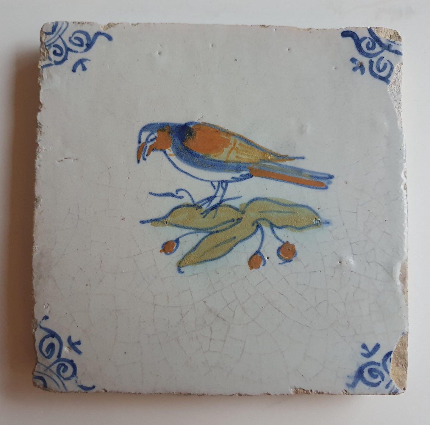 Antique Delft Tile – Polychrome Bird, Oxhead Motifs, c. 1625