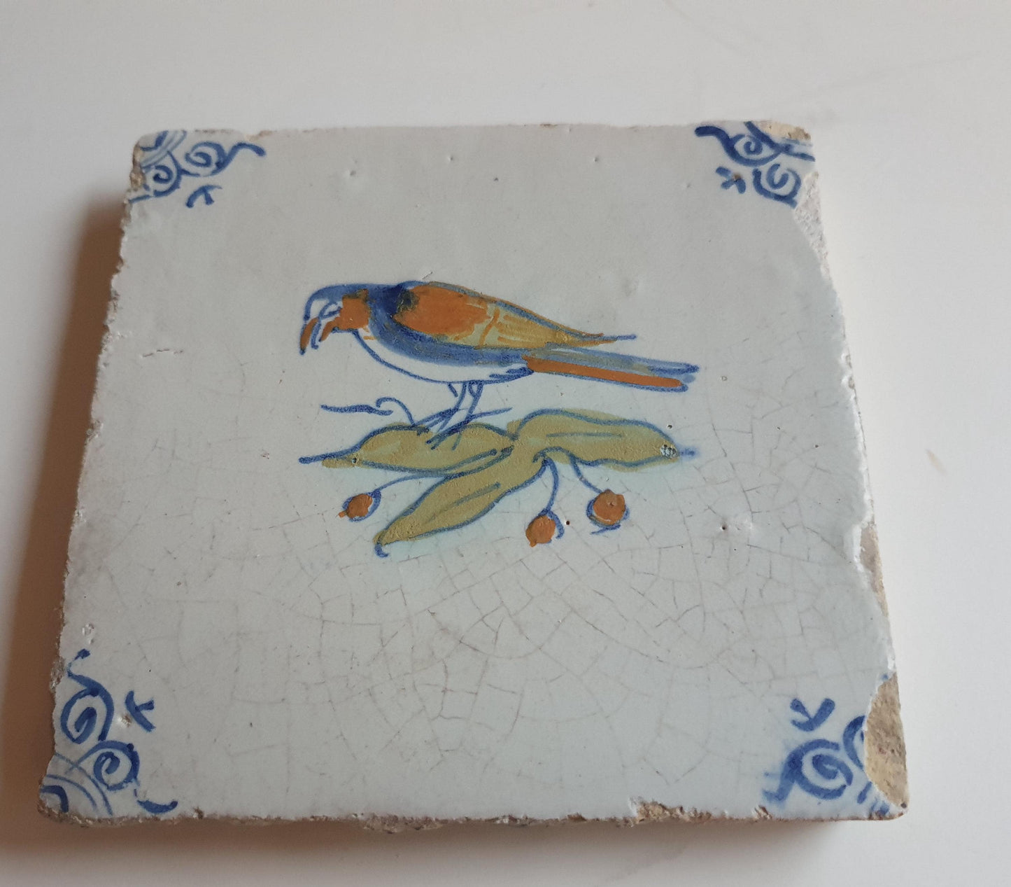 Antique Delft Tile – Polychrome Bird, Oxhead Motifs, c. 1625