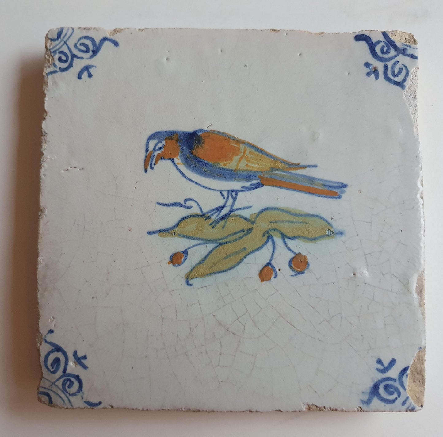 Antique Delft Tile – Polychrome Bird, Oxhead Motifs, c. 1625