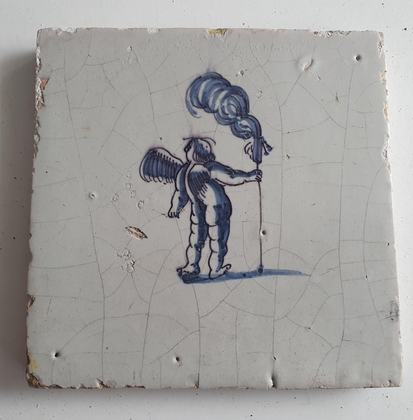 Antique Dutch Tile -  angel with ?  - Dated 1700, , delft blue , holland 17th century