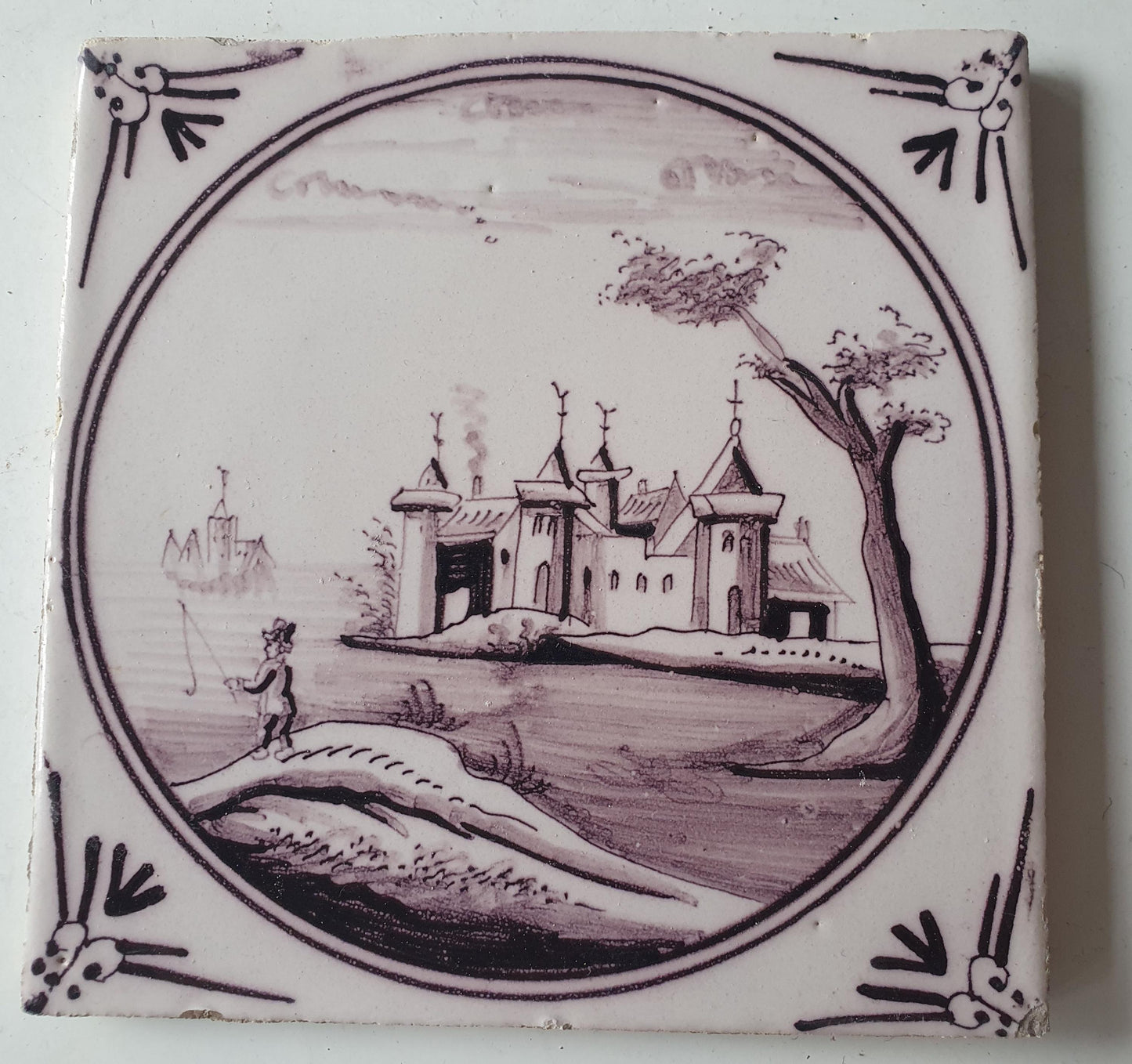 Around 1850 century Antique Dutch Tile - manganese landscape tegel castle with fischerman