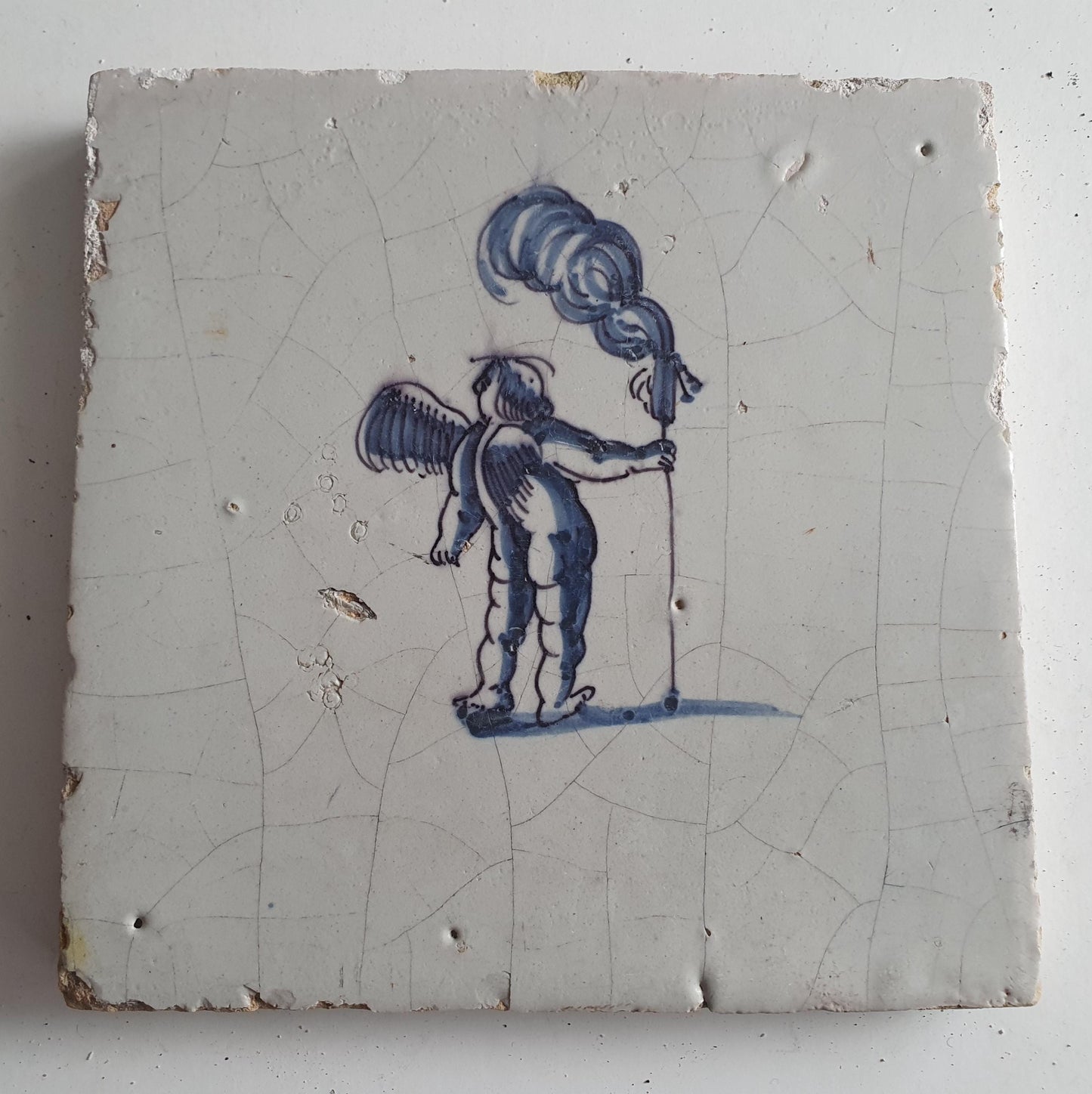 Antique Dutch Tile -  angel with ?  - Dated 1700, , delft blue , holland 17th century