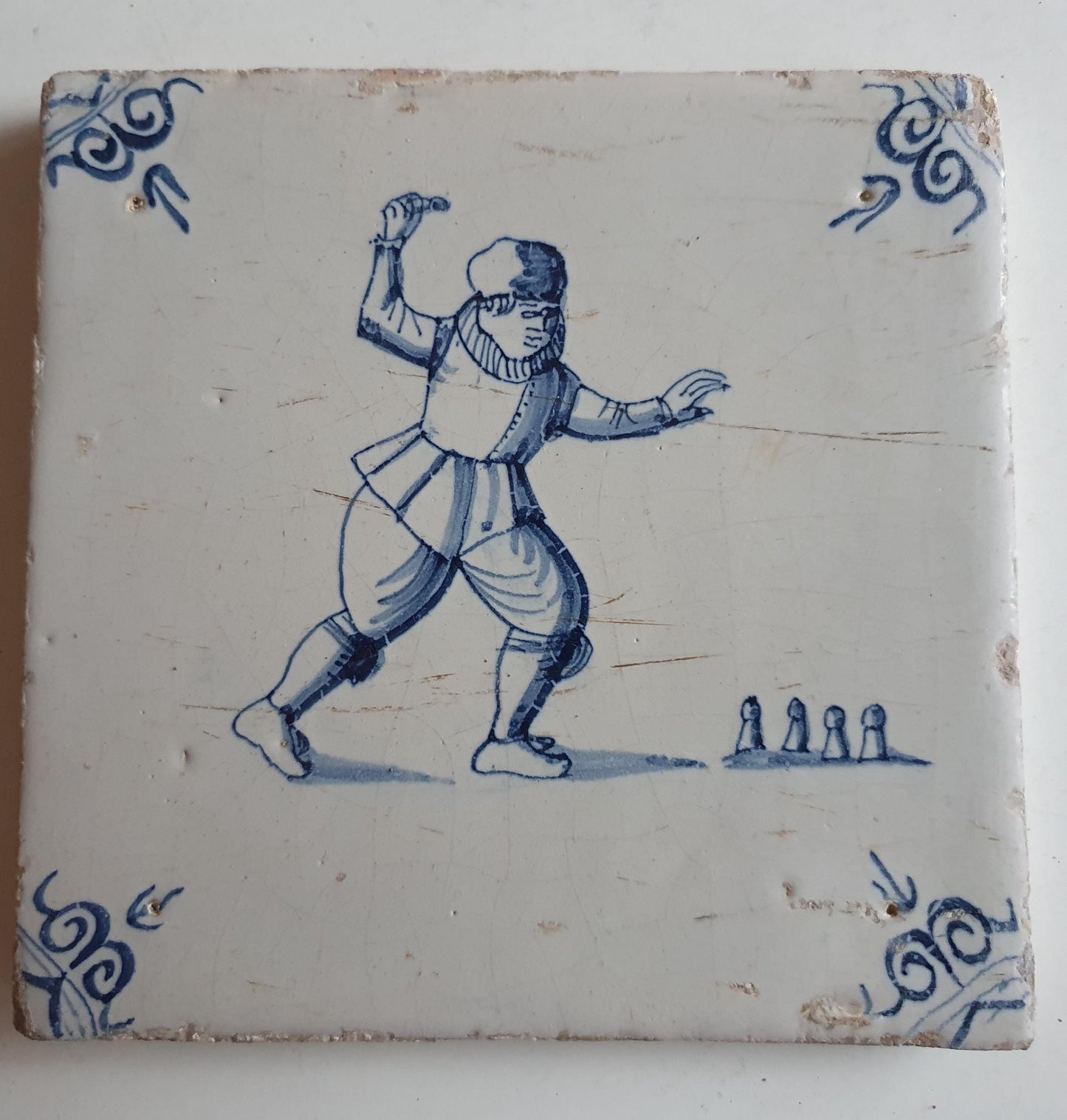 Antique Dutch Tile - child,s play  - Dated 1640, oxhead corner