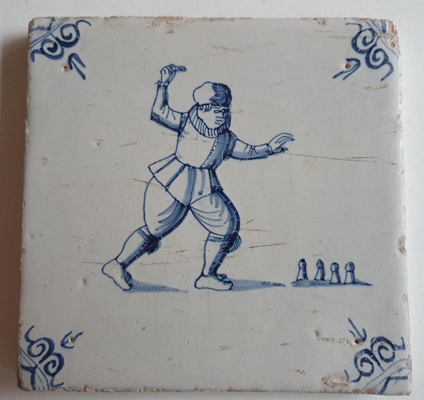Antique Dutch Tile - child,s play  - Dated 1640, oxhead corner