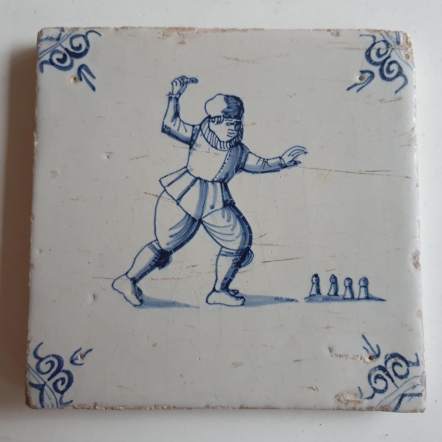 Antique Dutch Tile - child,s play  - Dated 1640, oxhead corner