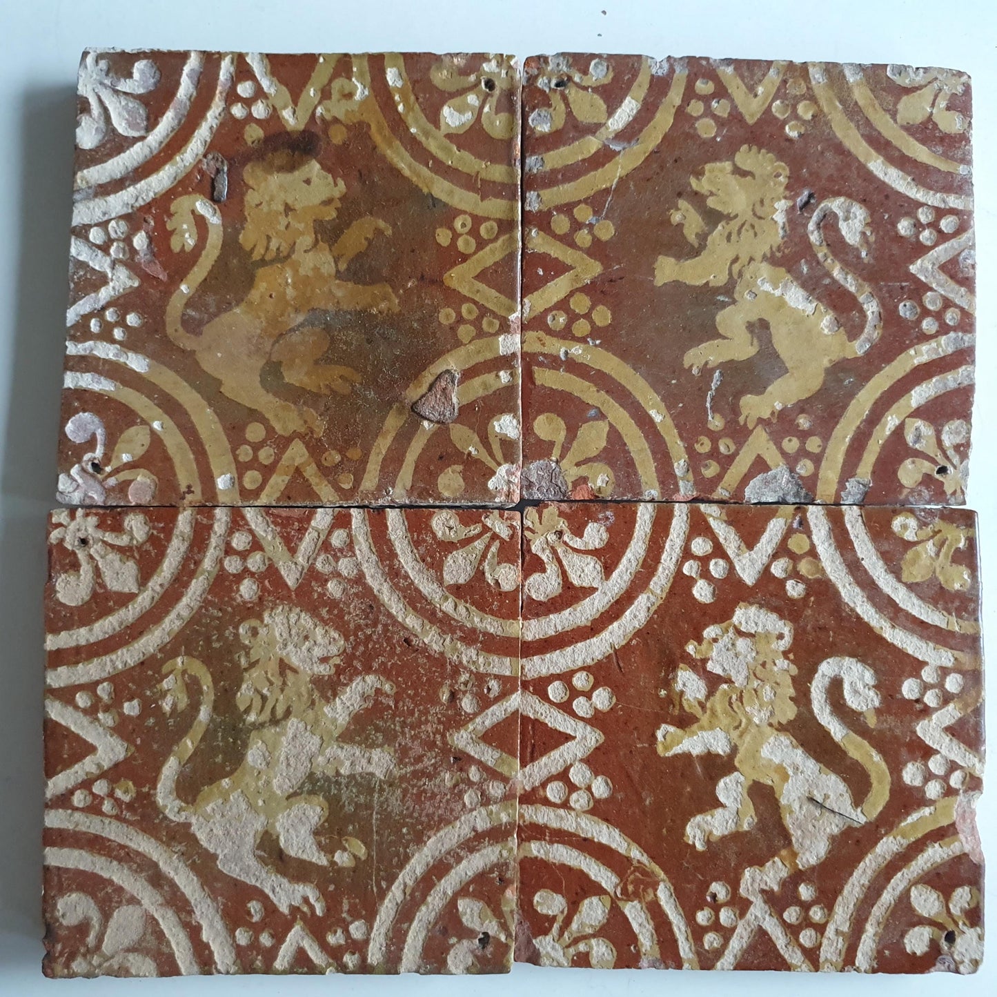 4 x 18th century Antique  Tile lion with lilyhead corner motive