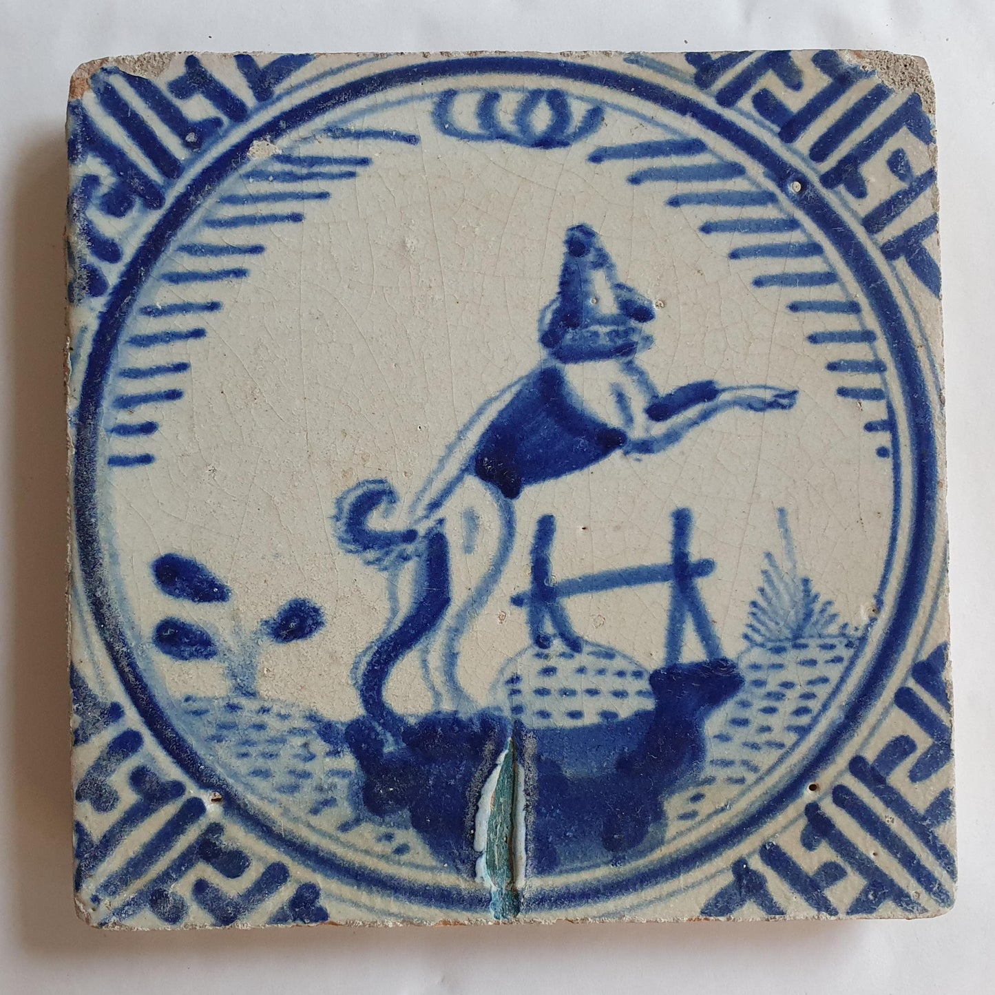 Antique Dutch Tile - Rotterdam Kroontegel, Rotterdamse,  dog , cirkel - Dated around 1625