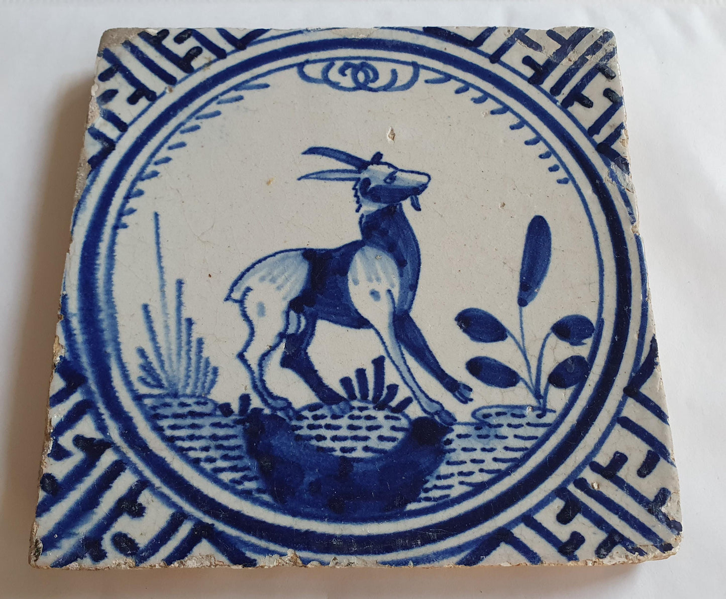 Antique Delft Dutch Tile - Rotterdam Kroontegel, Rotterdamse,  buck , cirkel - Dated around 1625