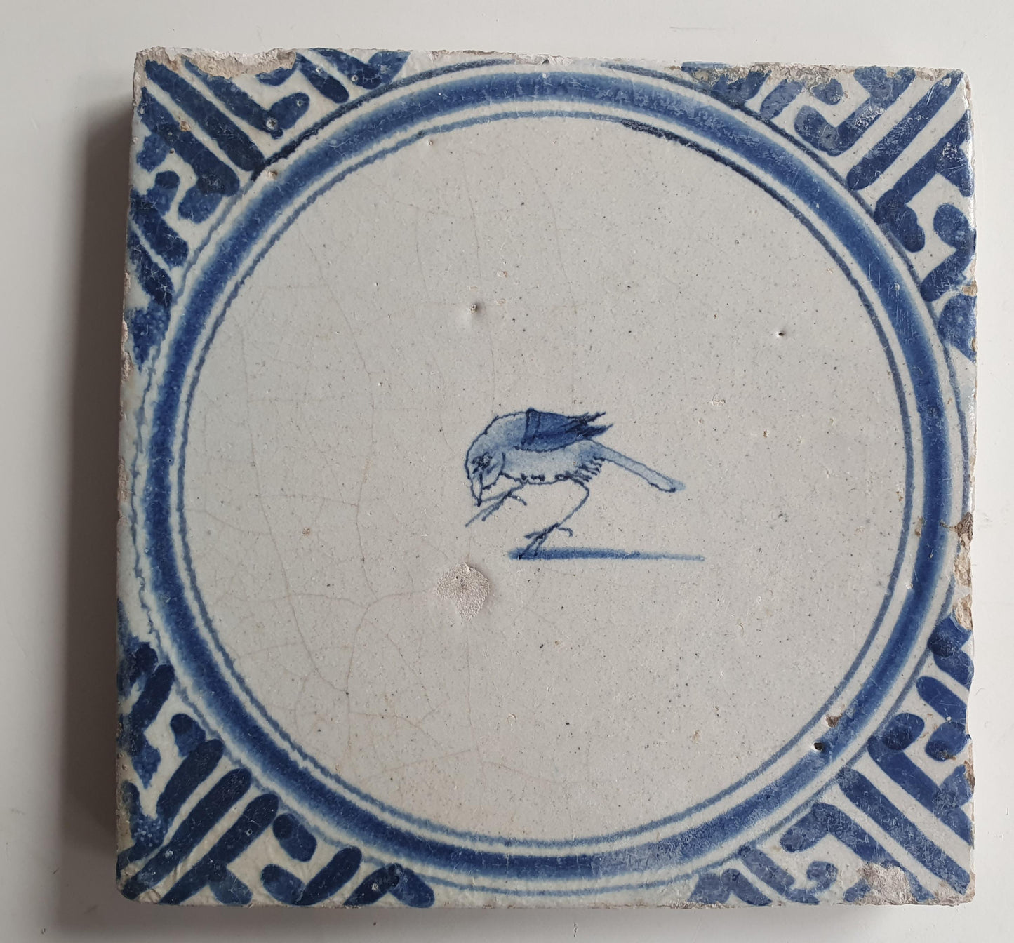 Antique Dutch circle Tile - wan-li cirkel - Dated around 1660, wan-li corner with bird