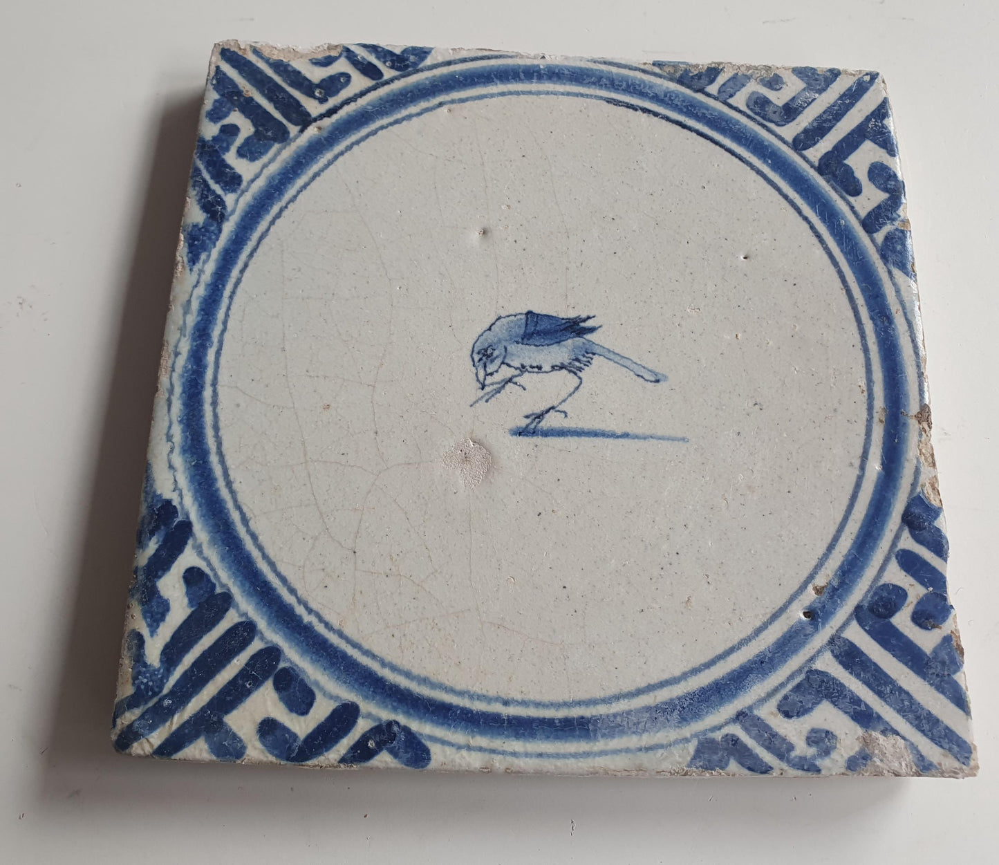 Antique Dutch circle Tile - wan-li cirkel - Dated around 1660, wan-li corner with bird