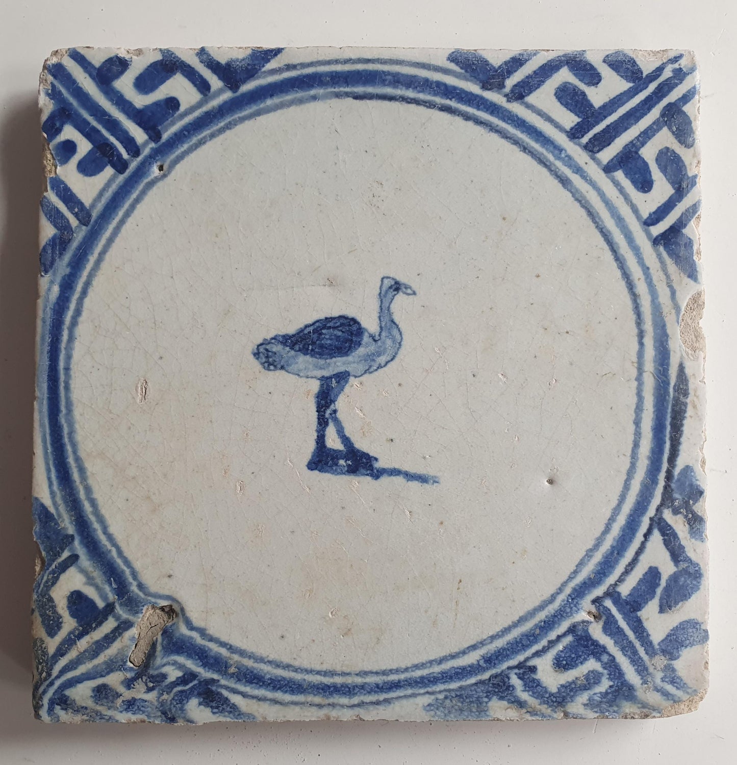 Antique Dutch circle Tile - wan-li cirkel - Dated around 1660, wan-li corner with ostrich