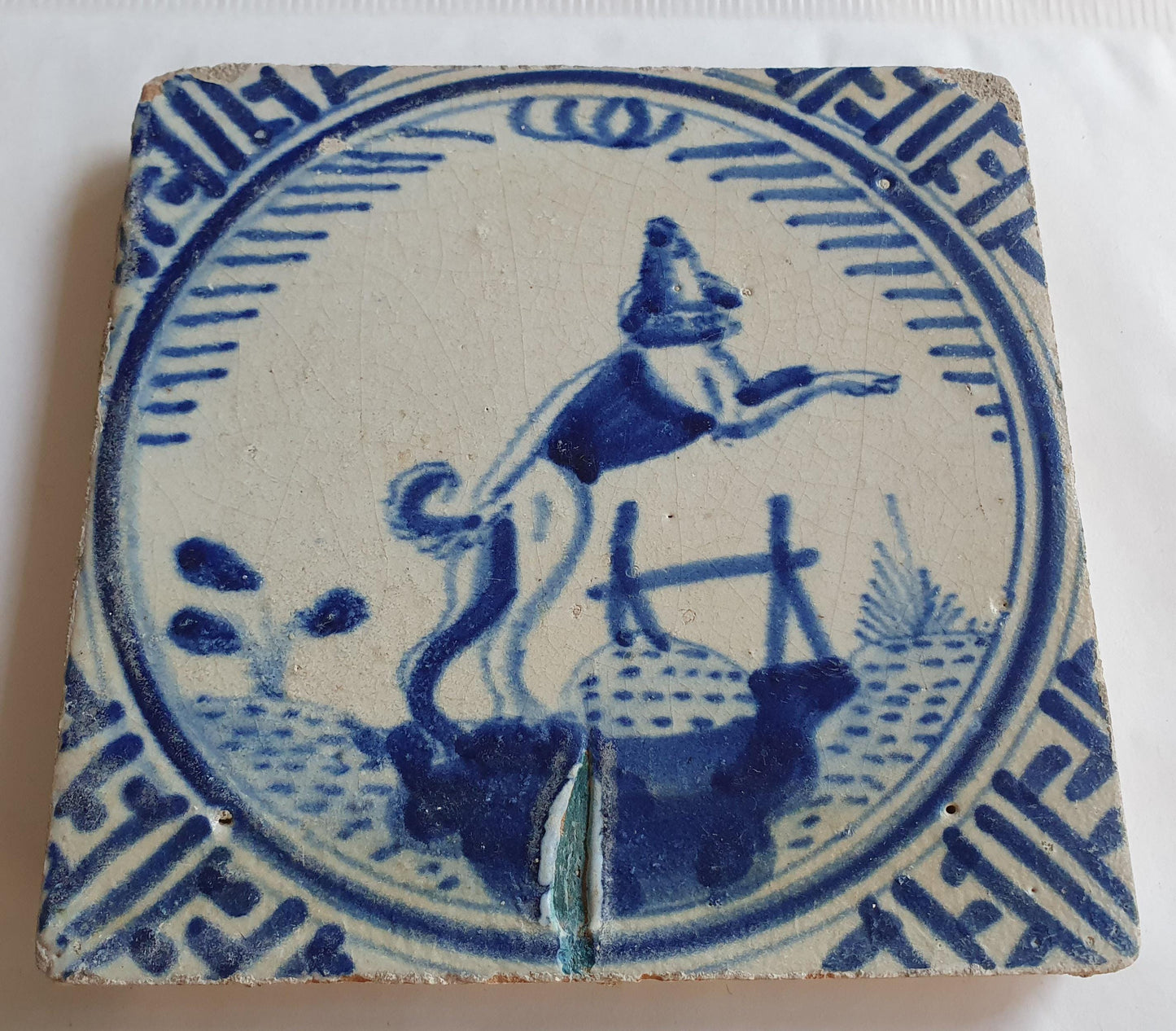 Antique Dutch Tile - Rotterdam Kroontegel, Rotterdamse,  dog , cirkel - Dated around 1625