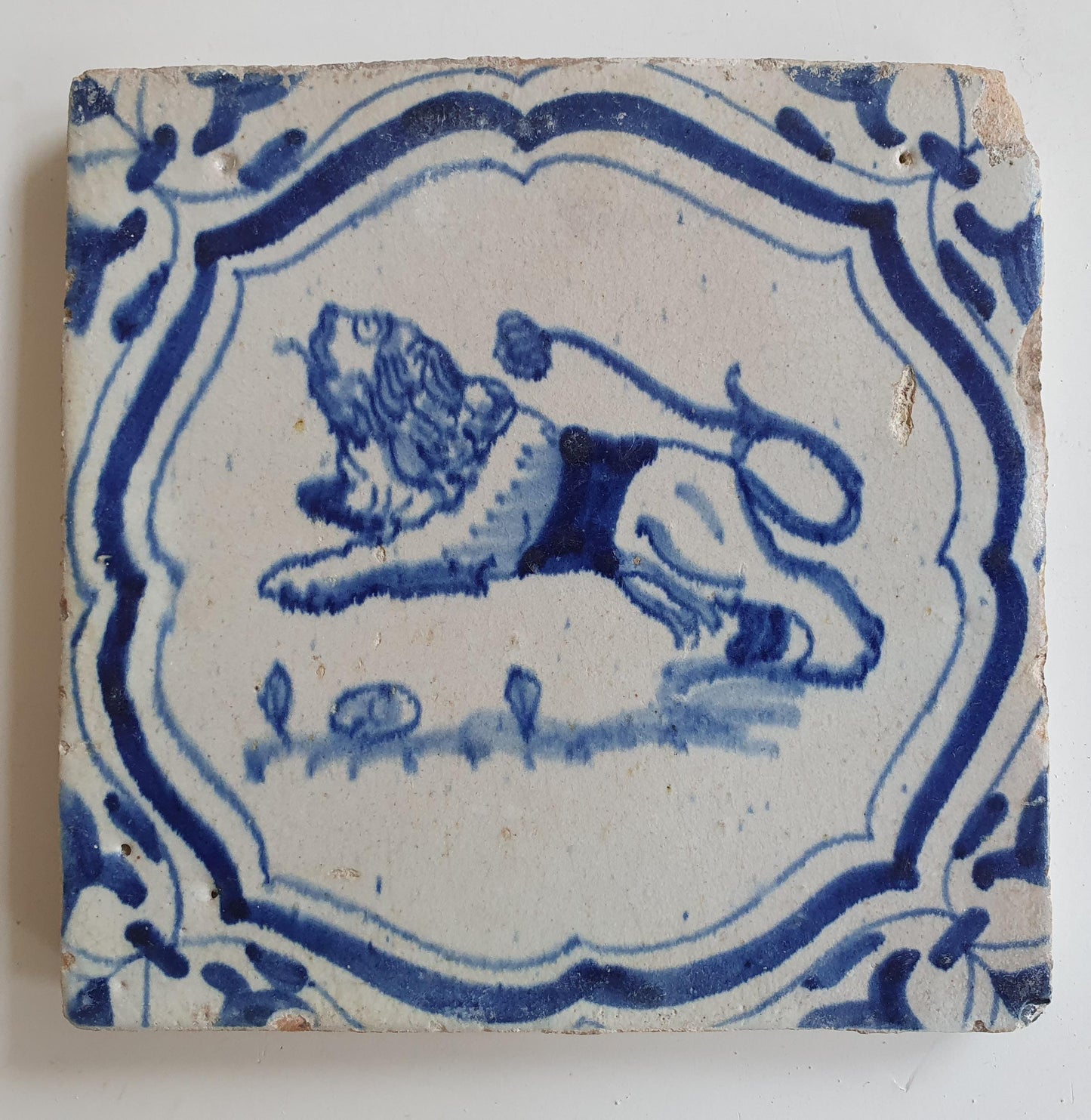 Antique Delft Tile – Lion Motif, Winged Leaf Border (1620-1640)